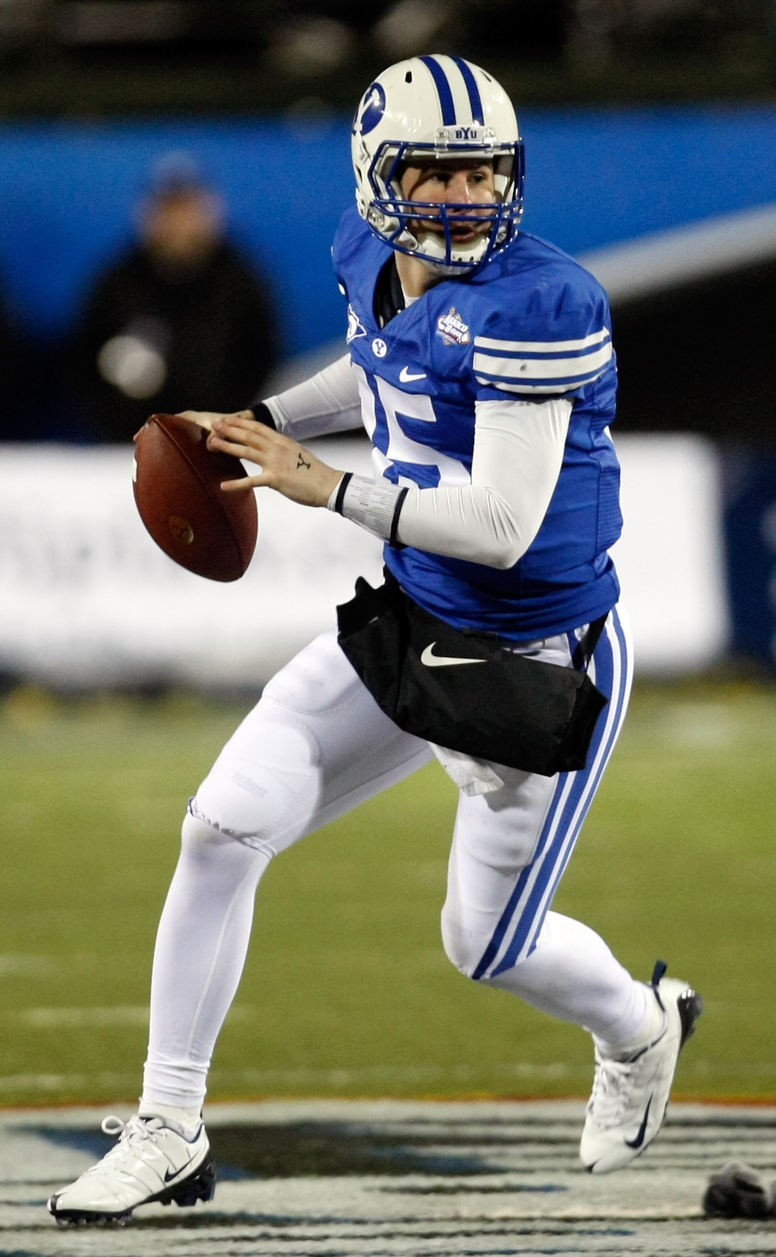 LAS VEGAS - DECEMBER 22:  Quarterback Max Hall #15 of the Brigham Young University Cougars looks to pass against the Oregon State Beavers during the MAACO Las Vegas Bowl at Sam Boyd Stadium December 22, 2009 in Las Vegas, Nevada.  (Photo by Ethan Miller/G