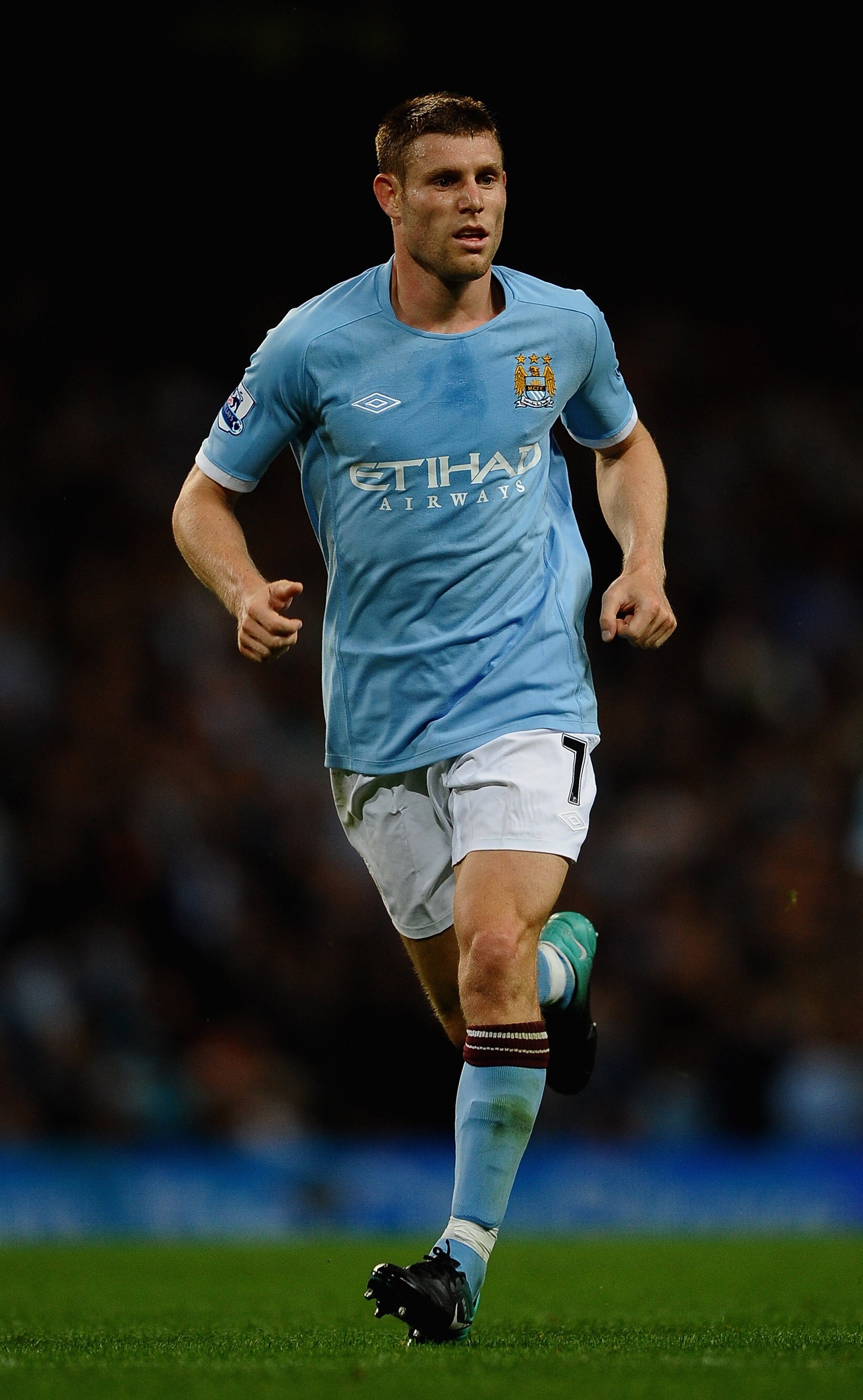 MANCHESTER, ENGLAND - AUGUST 23:  James Milner of Manchester City in action during the Barclays Premier League match between Manchester City and Liverpool at City of Manchester Stadium on August 23, 2010 in Manchester, England.  (Photo by Laurence Griffit