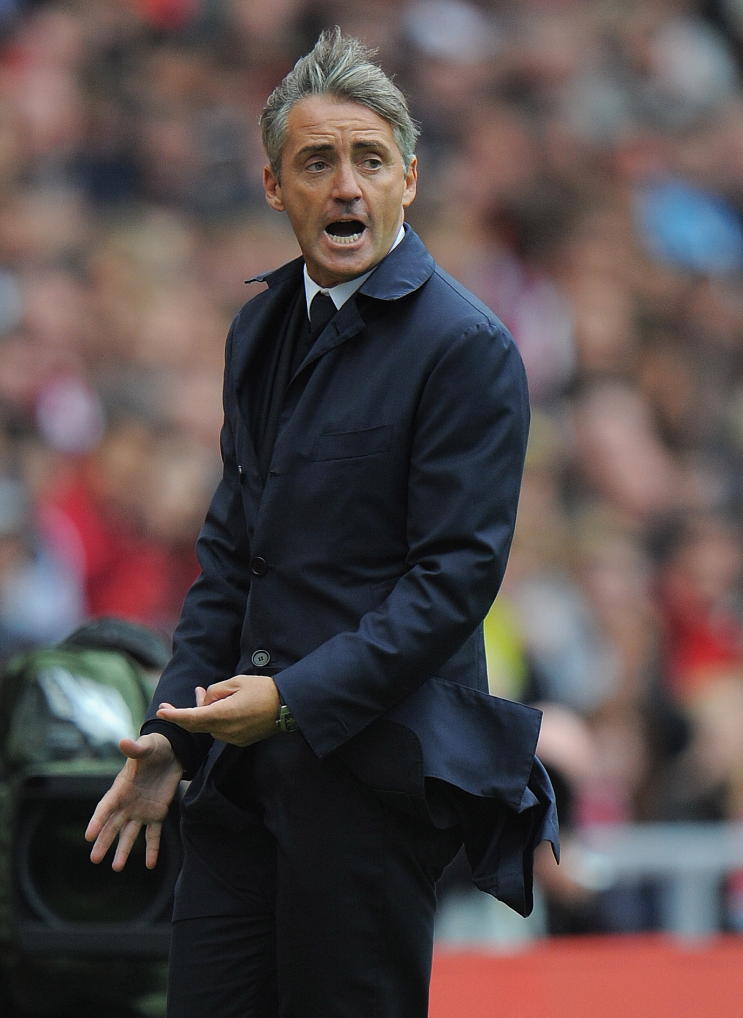 SUNDERLAND, ENGLAND - AUGUST 29:  Manchester City manager Roberto Mancini reacts during the Barclays Premier League match between Sunderland and Manchester City at the Stadium of Light on August 29, 2010 in Sunderland, England.  (Photo by Michael Regan/Ge