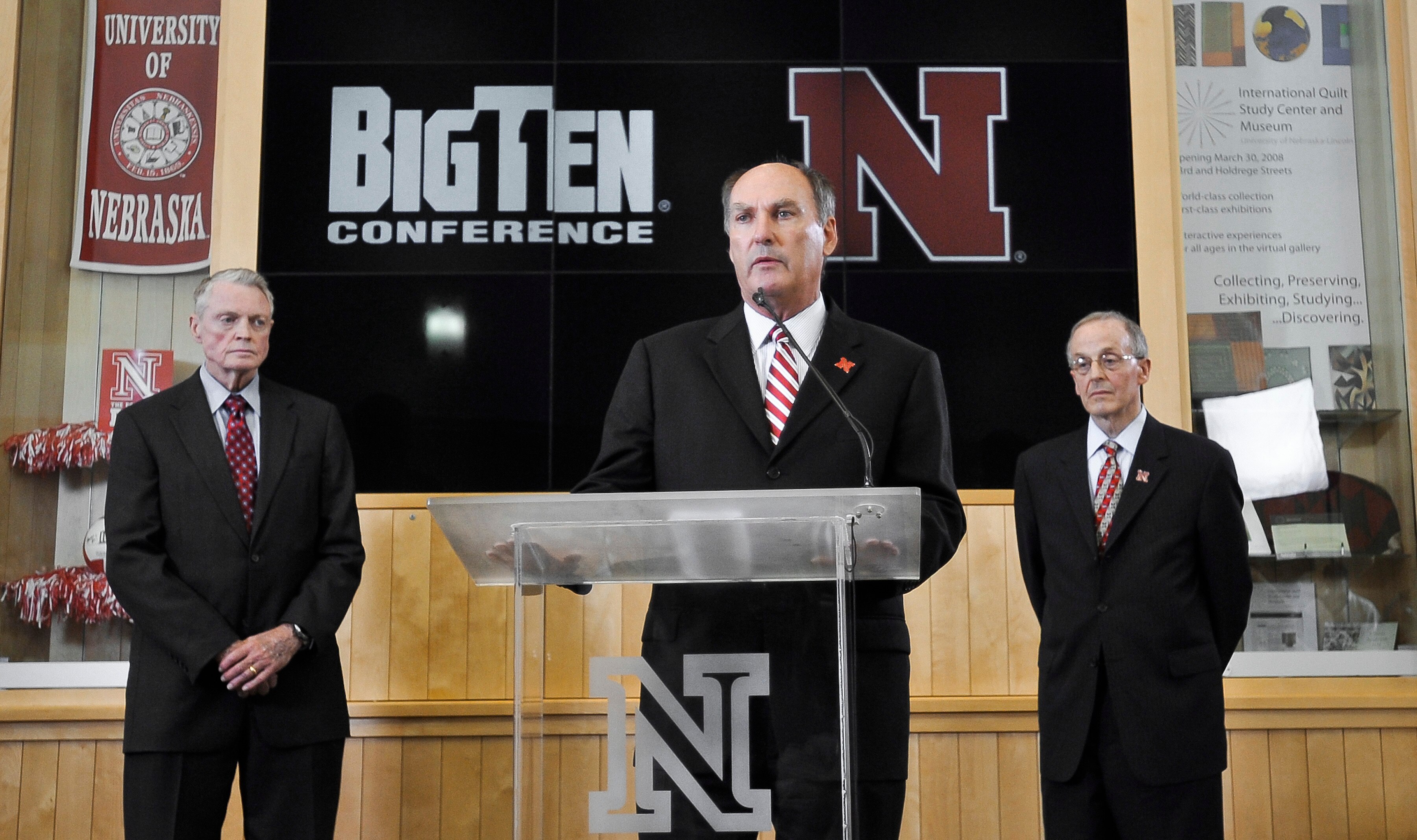 LINCOLN, NE  - JUNE 11:  Big Ten Conference Commissioner James Delany (C), flanked by (L) University of Nebraska Athletic Director Tom Osbourne and Chancellor Harvey Pearlman (R) inform members of the media that the university has accepted an invitation t