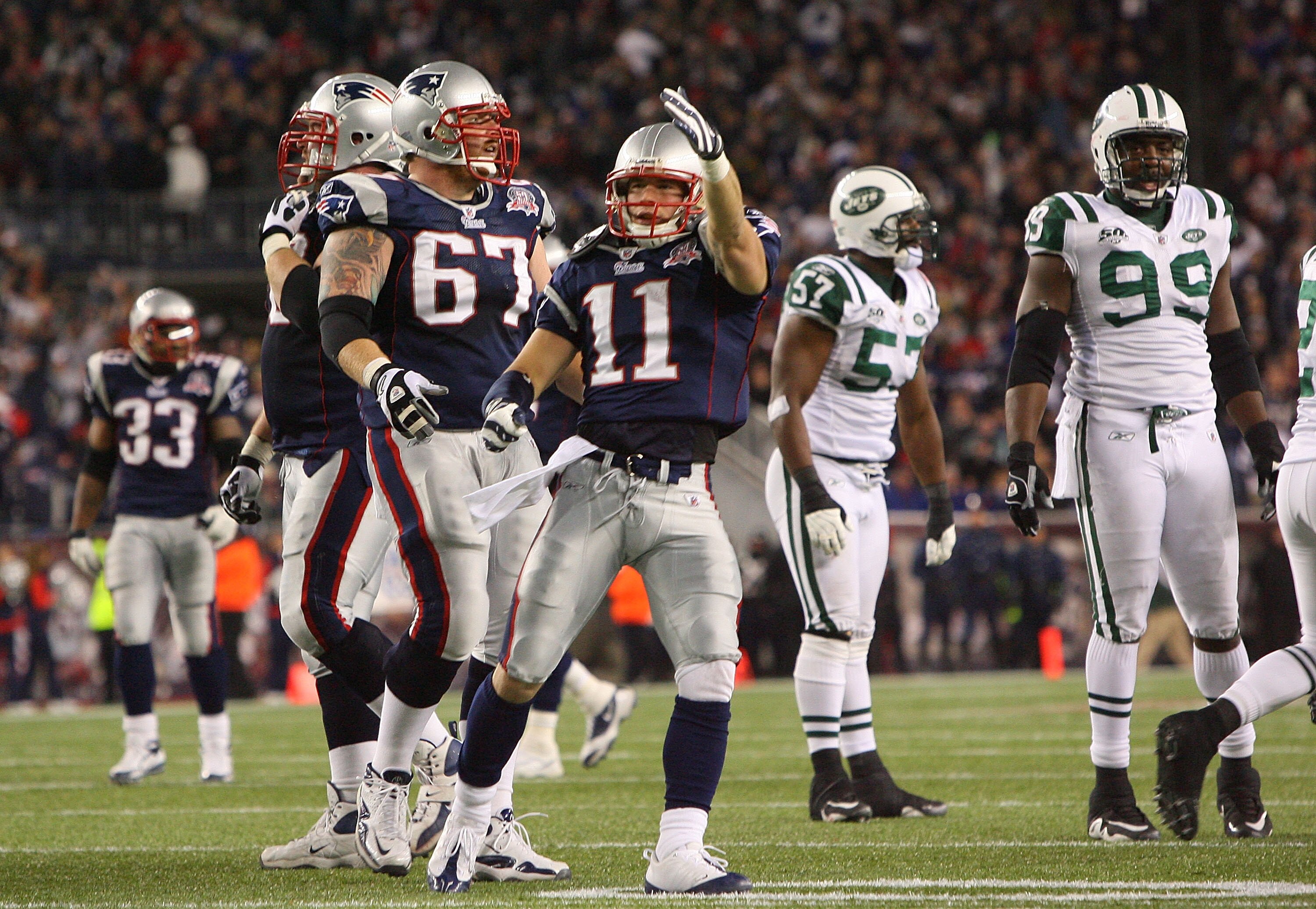 FOXBORO, MA - NOVEMBER 22:  Julian Edelman #11 and Dan Koppen #67 of the New England Patriots react in the fourth quarter against the New York Jets at Gillette Stadium on November 22, 2009 in Foxboro, Massachusetts. The Patriots won 31-14. (Photo by Jim R