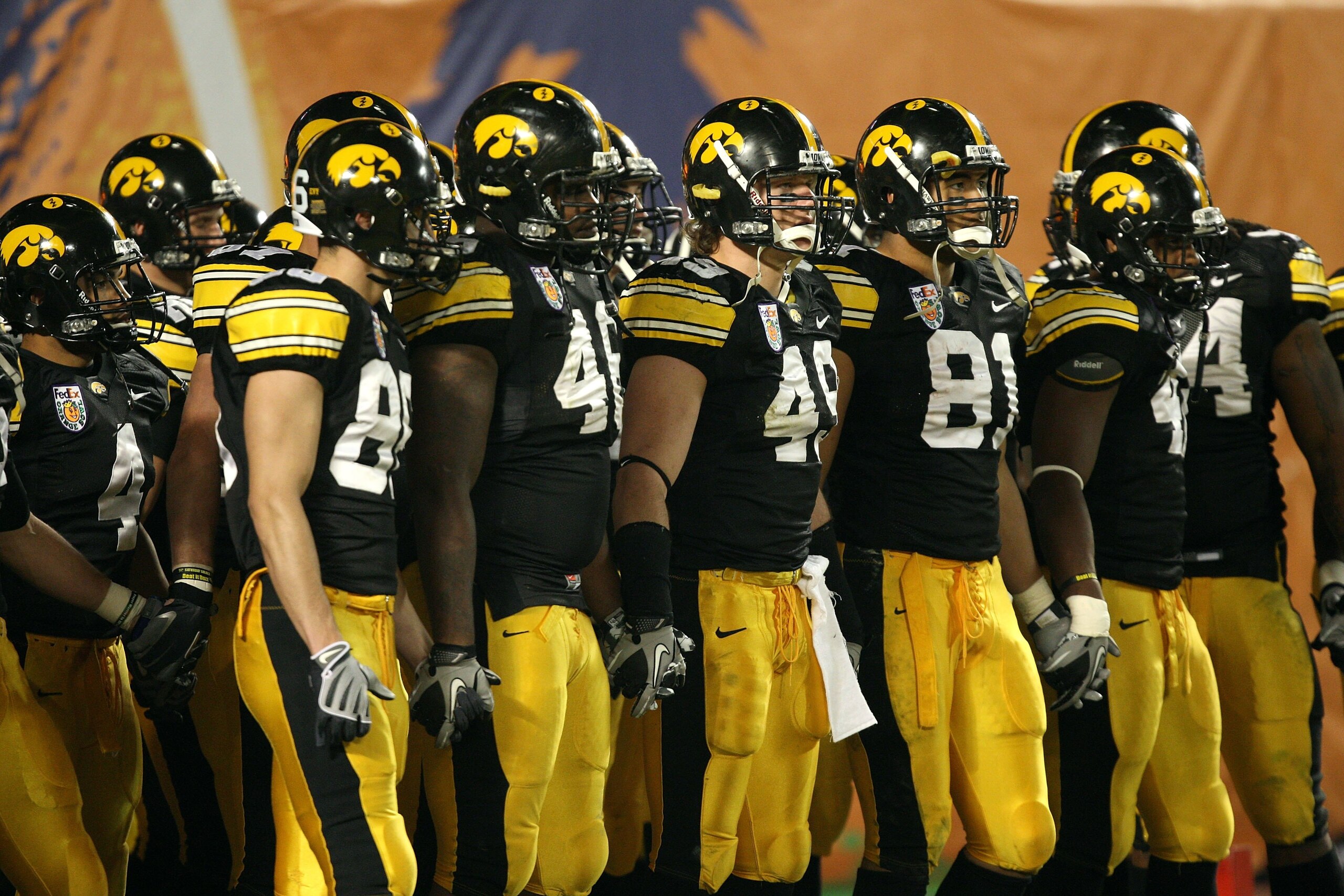 MIAMI GARDENS, FL - JANUARY 05:  The Iowa Hawkeyes get set to walk on the field against the Georgia Tech Yellow Jackets during the FedEx Orange Bowl at Land Shark Stadium on January 5, 2010 in Miami Gardens, Florida.  (Photo by Streeter Lecka/Getty Images