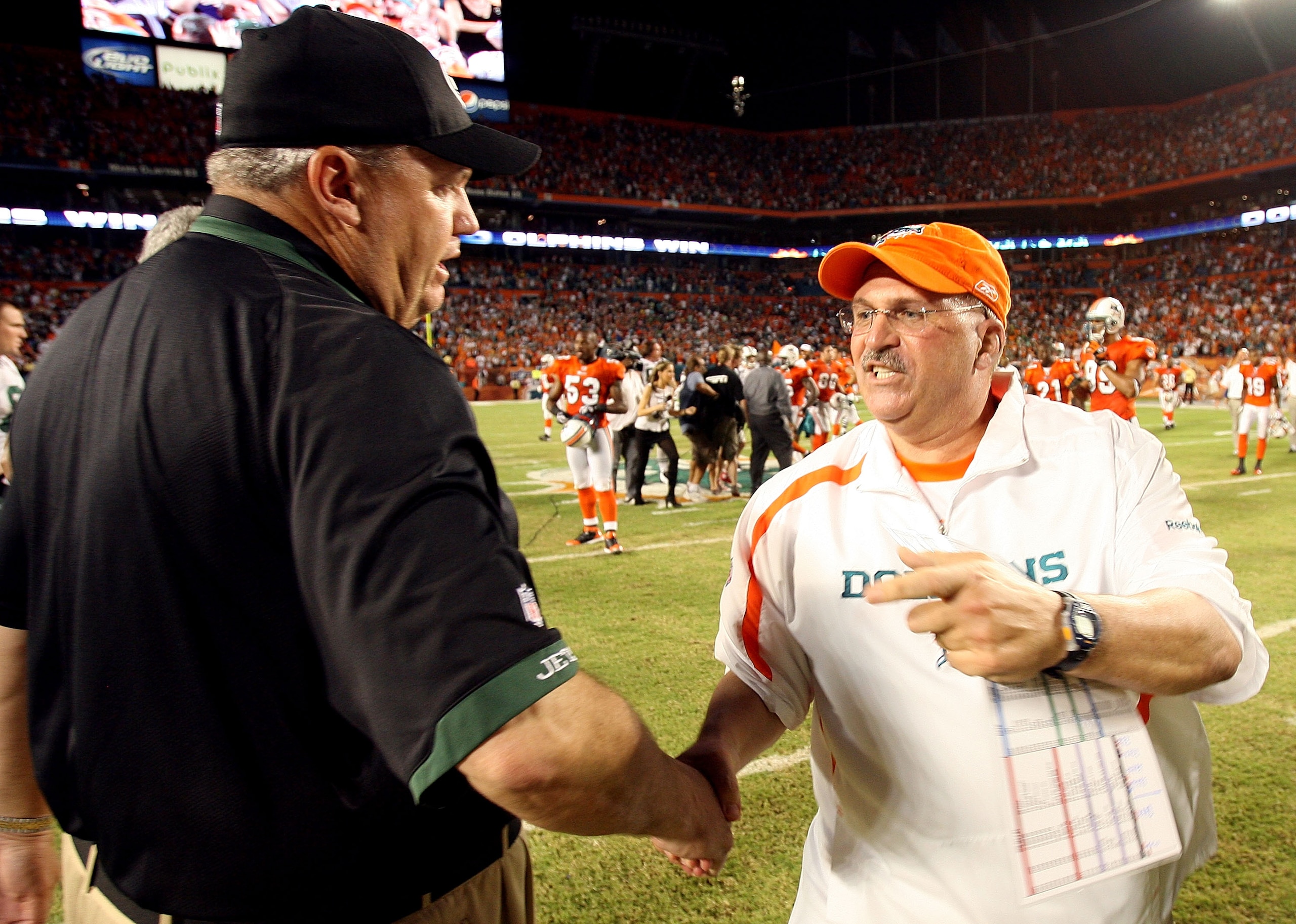 MIAMI - OCTOBER 12:  Head coach Rex Ryan of the New York Jets congratulates head coach Tony Sparano of the Miami Dolphins at Land Shark Stadium on October 12, 2009 in Miami, Florida. The Dolphins defeated the Jets 31-27.  (Photo by Doug Benc/Getty Images)