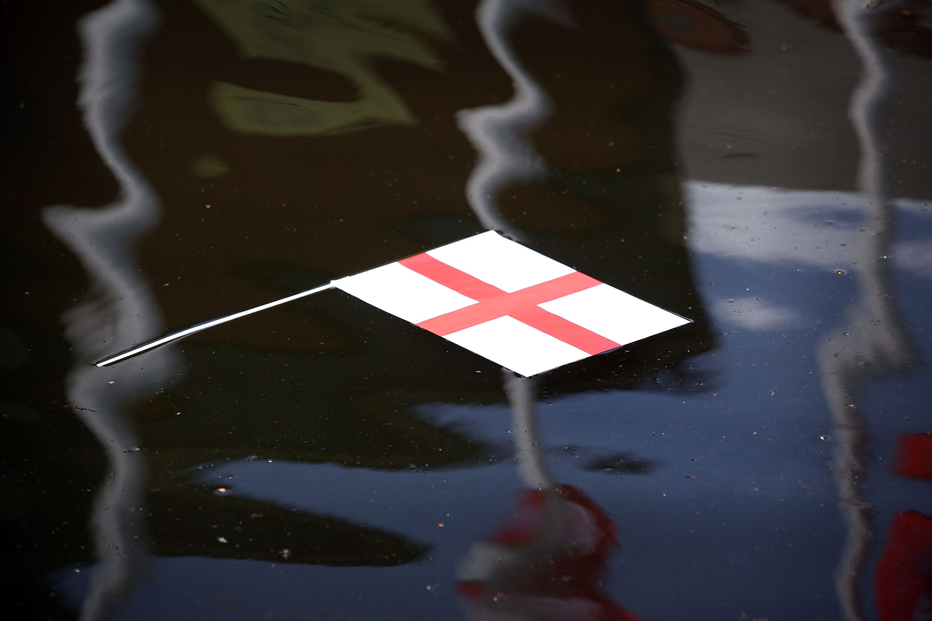 MANCHESTER, ENGLAND - JUNE 27:  An England flag floats in a Manchester Canal after England lose 4-1 to Germany  on June 27, 2010 in Manchester, England. England were knocked out of   the FIFA 2010 World Cup competition by 4 goals to 1 in South Africa  (Ph