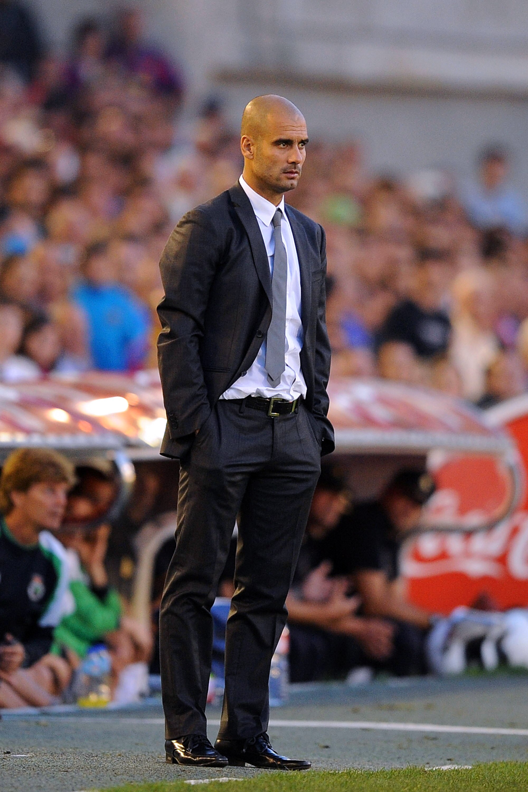 SANTANDER, SPAIN - AUGUST 29:  Josep Guardiola manager of Barcelona watches his team play Racing Santander the La Liga match between Racing Santander and Barcelona at El Sardinero stadium on August 29, 2010 in Santander, Spain.  (Photo by Denis Doyle/Gett