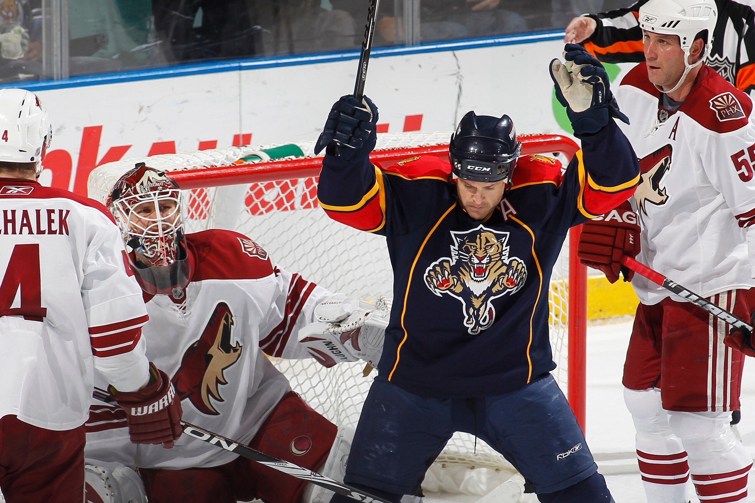 SUNRISE, FL - MARCH 18: Goaltender Ilya Bryzgalov #30 of the Phoenix Coyotes looks up as Cory Stillman #61 of the Florida Panthers celebrates a goal scored by Stephen Weiss (not pictured) on March 18, 2010 at the BankAtlantic Center in Sunrise, Florida. (