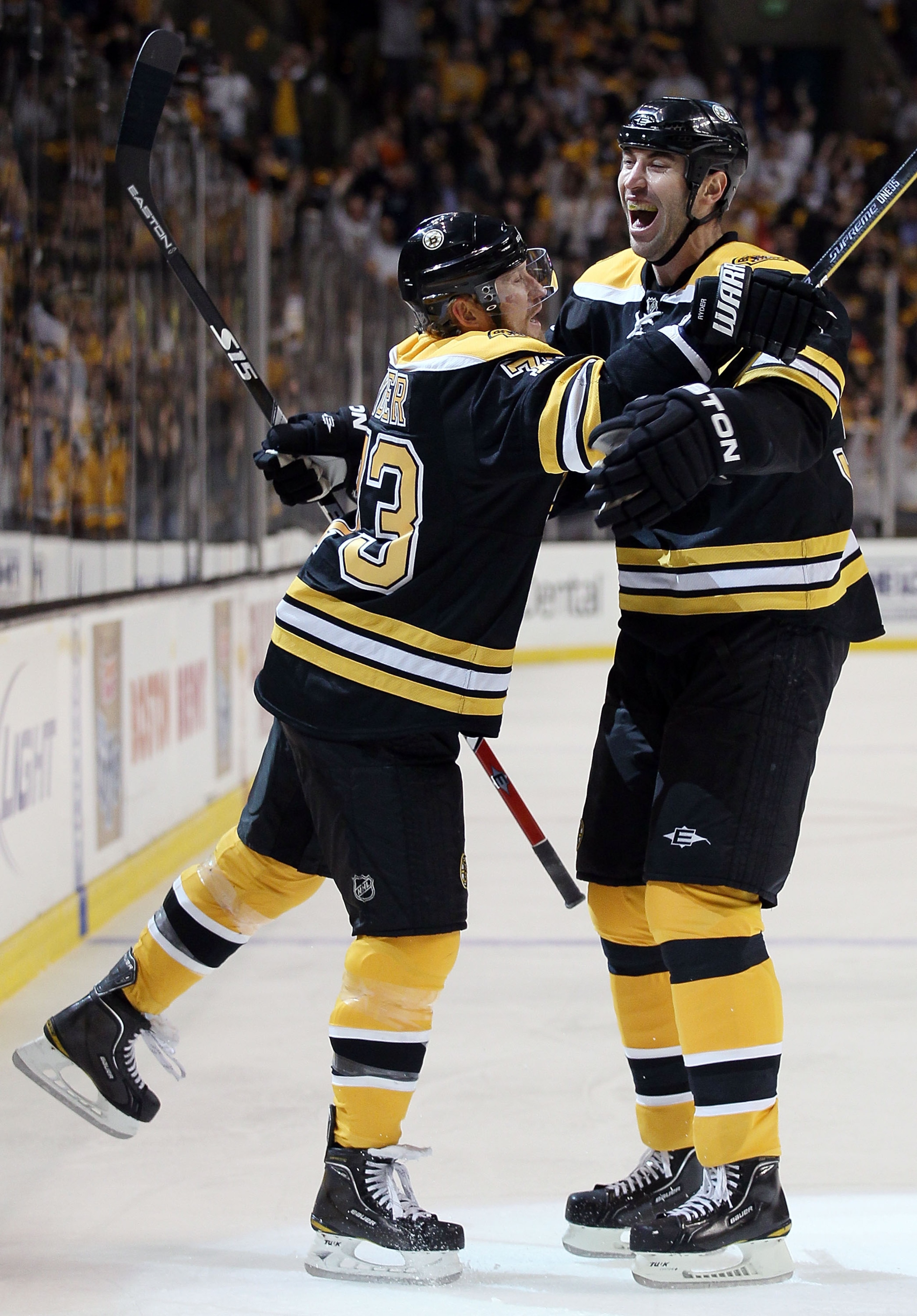 BOSTON - MAY 14:  Michael Ryder #73 of the Boston Bruins celebrates his goal with teammate Zdeno Chara #33 in the first period against the Philadelphia Flyers in Game Seven of the Eastern Conference Semifinals during the 2010 NHL Stanley Cup Playoffs at T