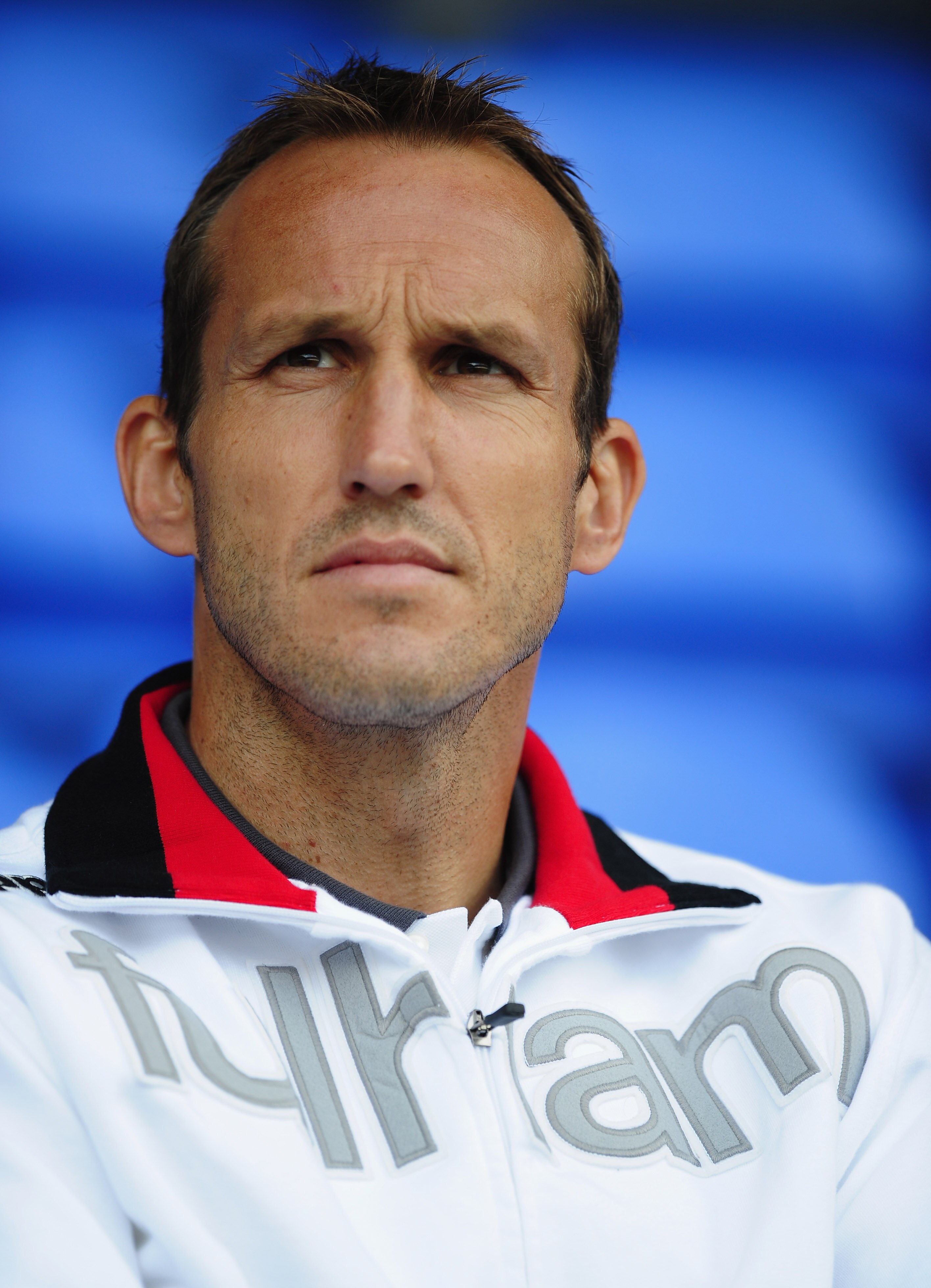 BOLTON, ENGLAND - AUGUST 14:  Mark Schwarzer of Fulham looks on from the stands during the Barclays Premier League match between Bolton Wanderers and Fulham at Reebok Stadium on August 14, 2010 in Bolton, England.  (Photo by Laurence Griffiths/Getty Image