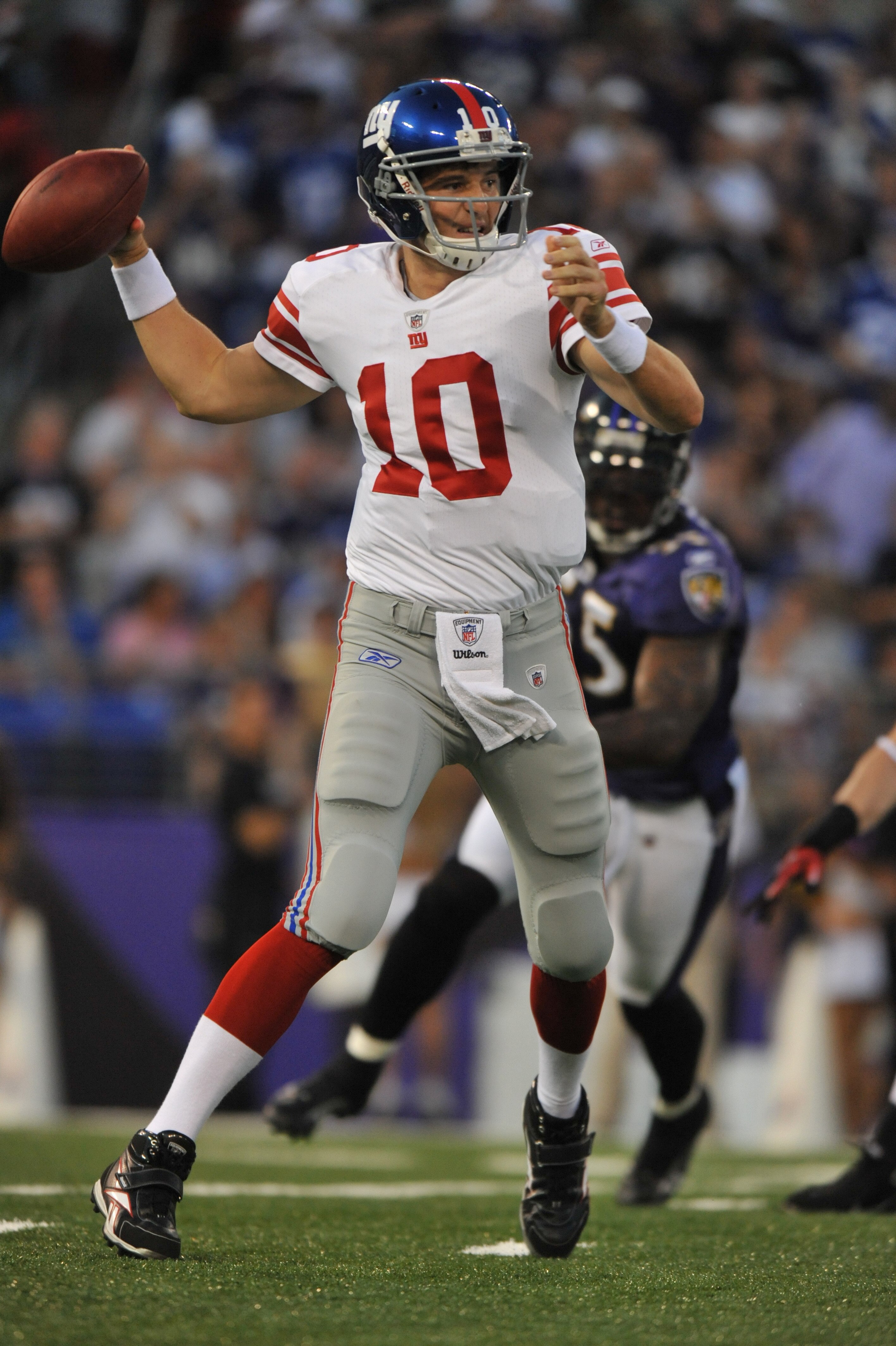 BALTIMORE - AUGUST 28:  Eli Manning #10 of the New York Giants passes against the Baltimore Ravens at M&T Bank Stadium on August 28, 2010 in Baltimore, Maryland. The Ravens lead the Giants at halftime 17-3. (Photo by Larry French/Getty Images)