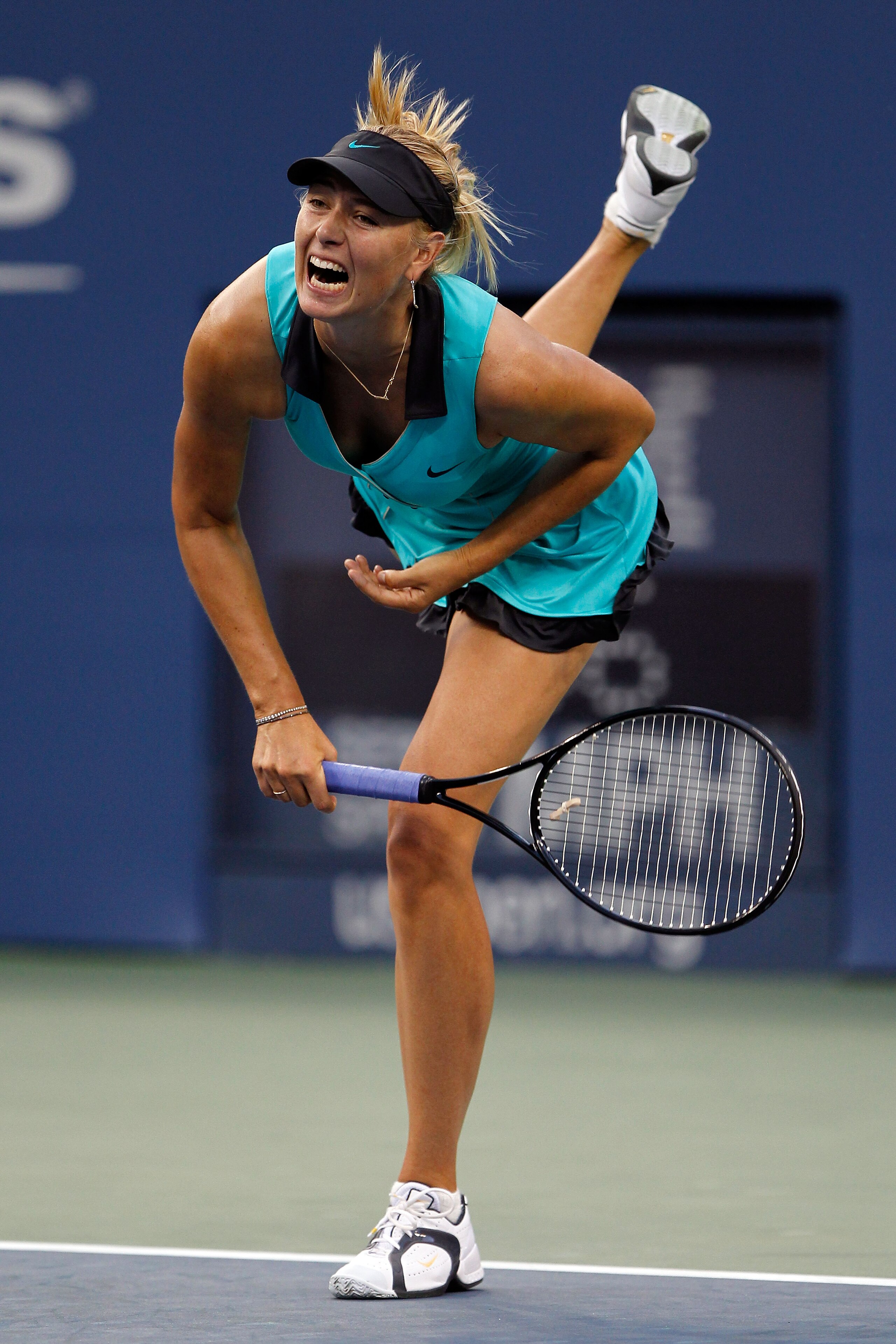 NEW YORK - AUGUST 31:  Maria Sharapova of Russia serves against Jarmila Groth of Australia during her women's singles first round match on day two of the 2010 U.S. Open at the USTA Billie Jean King National Tennis Center on August 31, 2010 in the Flushing