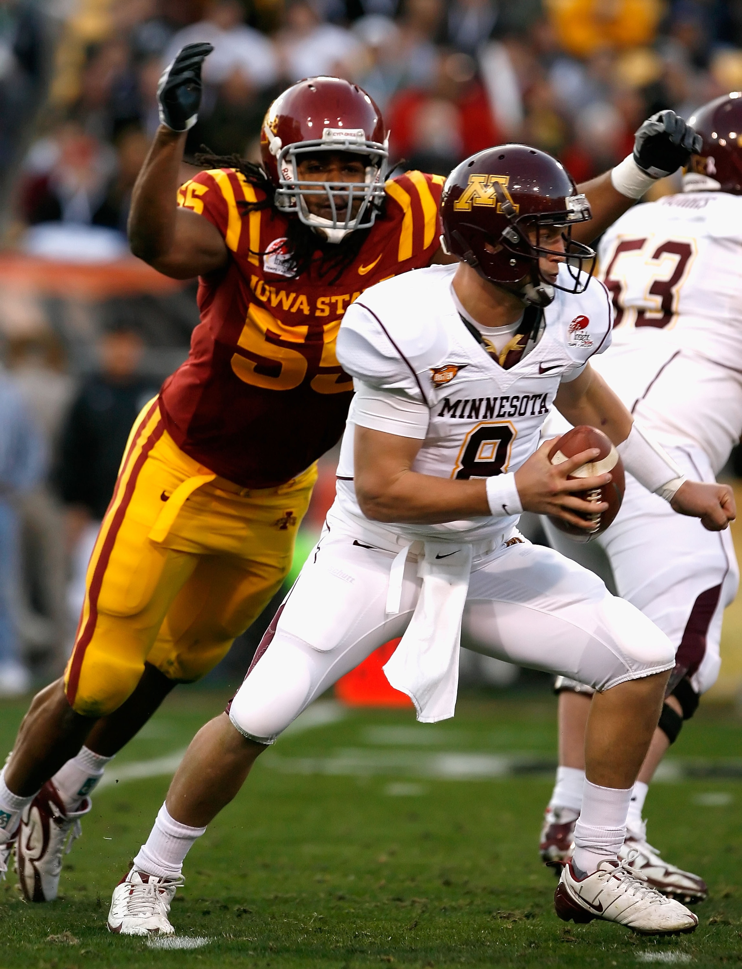TEMPE, AZ - DECEMBER 31:  Quarterback Adam Weber #8 of the Minnesota Golden Gophers is sacked by Christopher Lyle #55 of the Iowa State Cyclones during the second quarter of the Insight Bowl at Arizona Stadium on December 31, 2009 in Tempe, Arizona.  (Pho