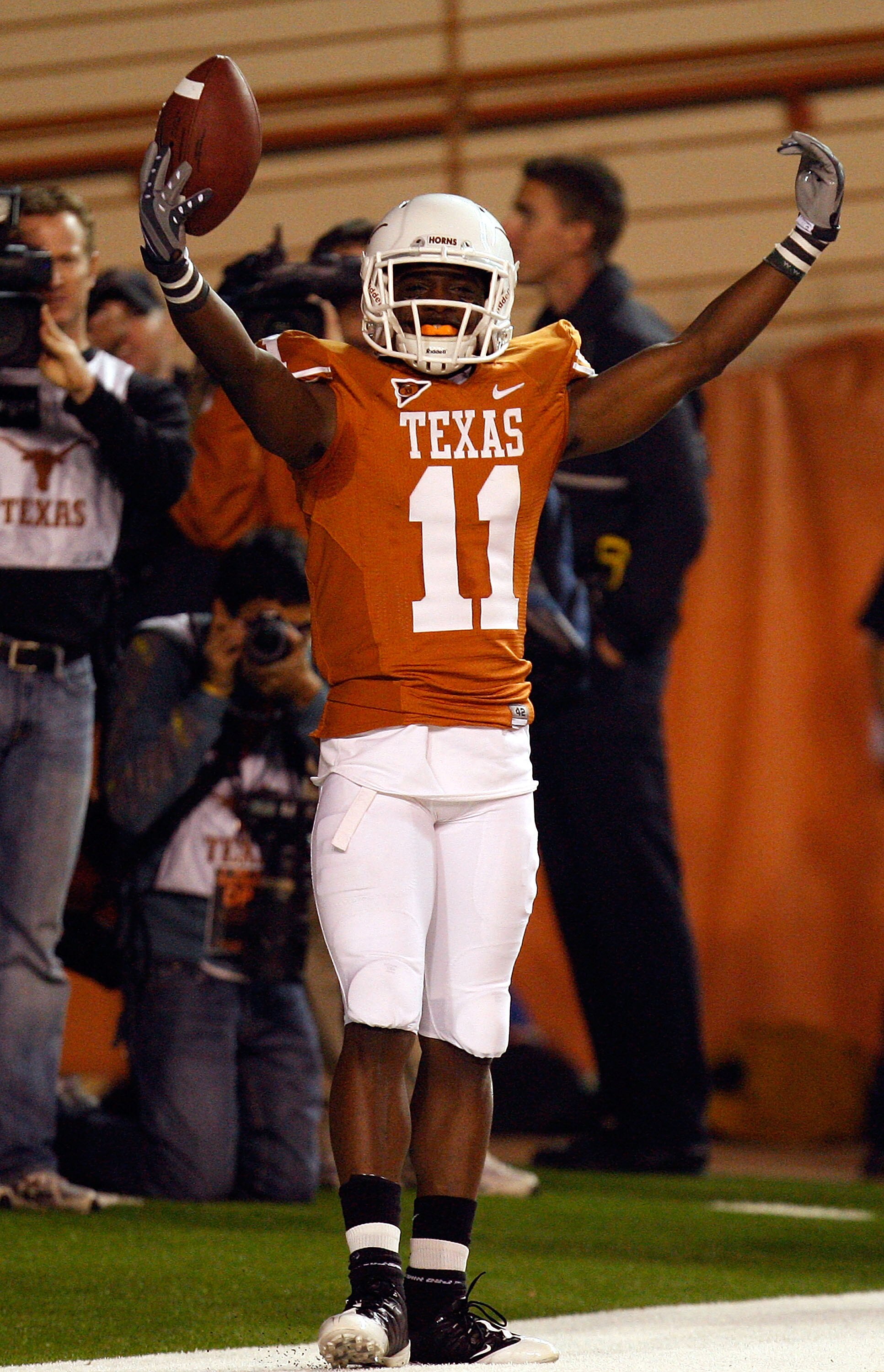 AUSTIN, TX - NOVEMBER 21:  Wide receiver James Kirkendoll #11 of the Texas Longhorns celebrates a touchdown against the Kansas Jayhawks at Darrell K Royal-Texas Memorial Stadium on November 21, 2009 in Austin, Texas.  (Photo by Ronald Martinez/Getty Image