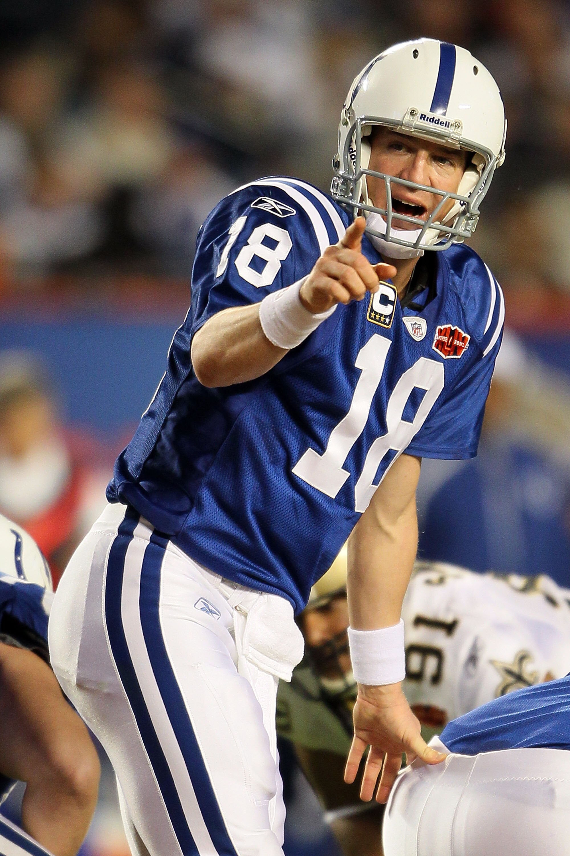 MIAMI GARDENS, FL - FEBRUARY 07: Peyton Manning #18 of the Indianapolis Colts signals under center against the New Orleans Saints during Super Bowl XLIV on February 7, 2010 at Sun Life Stadium in Miami Gardens, Florida.  (Photo by Andy Lyons/Getty Images)