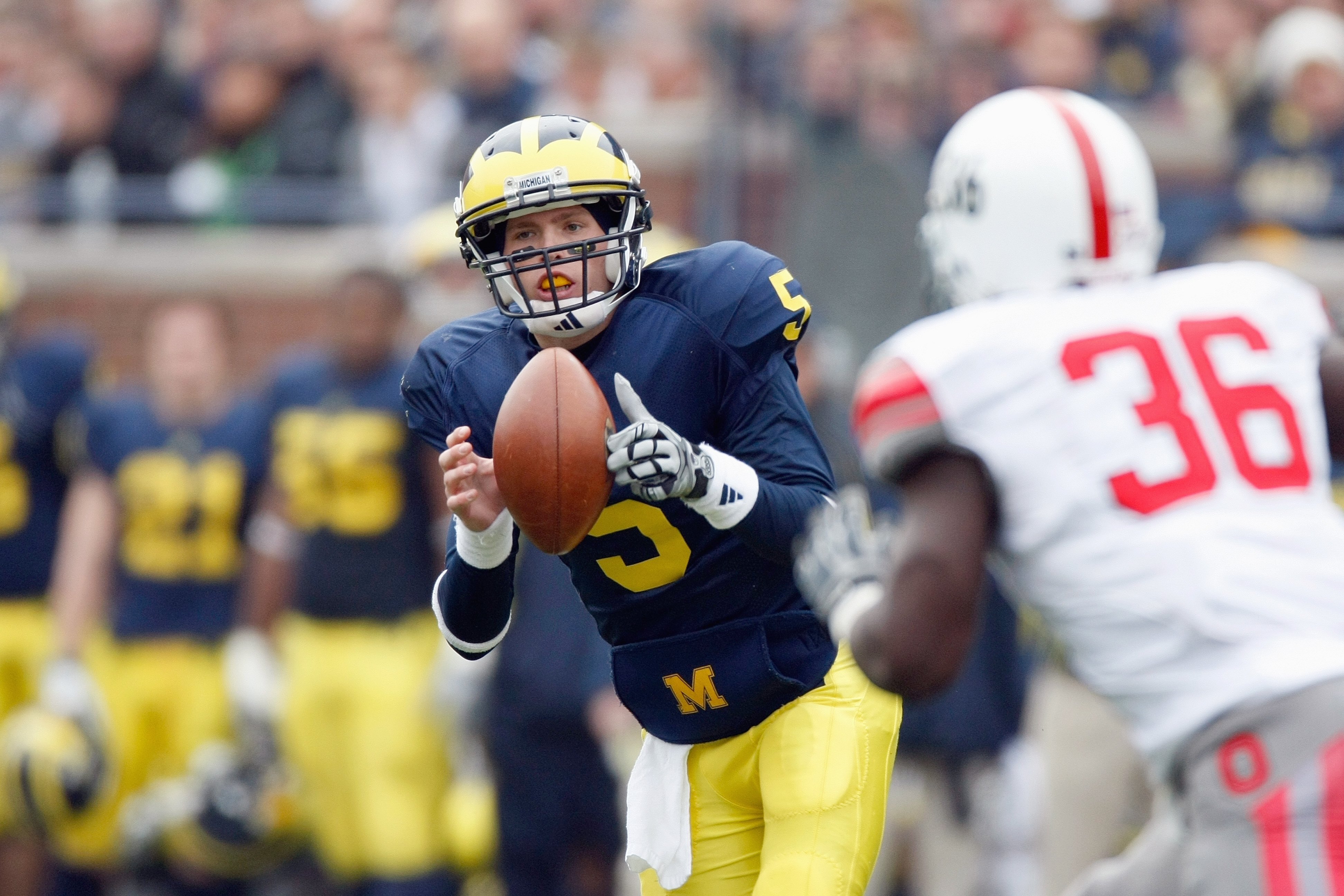 ANN ARBOR, MI - NOVEMBER 21:  Quarterback Tate Forcier #5 of the Michigan Wolverines looks to pass the ball during the game against the Ohio State Buckeyes on November 21, 2009 at Michigan Stadium in Ann Arbor, Michigan. Ohio State won the game 21-10. (Ph