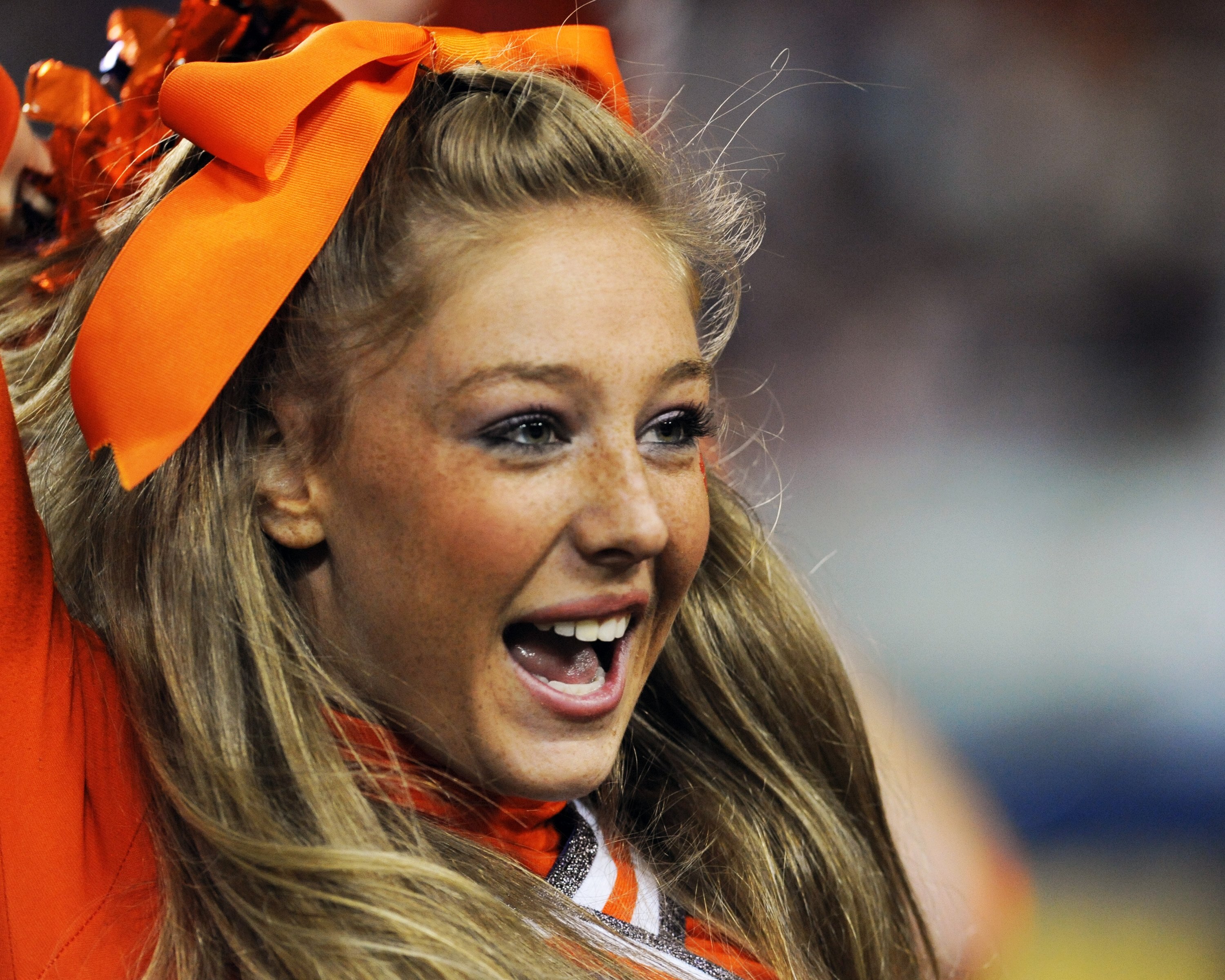 TAMPA, FL - NOVEMBER 28: A cheerleader of the Clemson Tigers cheers play against the Georgia Tech Yellow Jackets in the 2009 ACC Football Championship Game December 5, 2009 at Raymond James Stadium in Tampa, Florida.  (Photo by Al Messerschmidt/Getty Imag