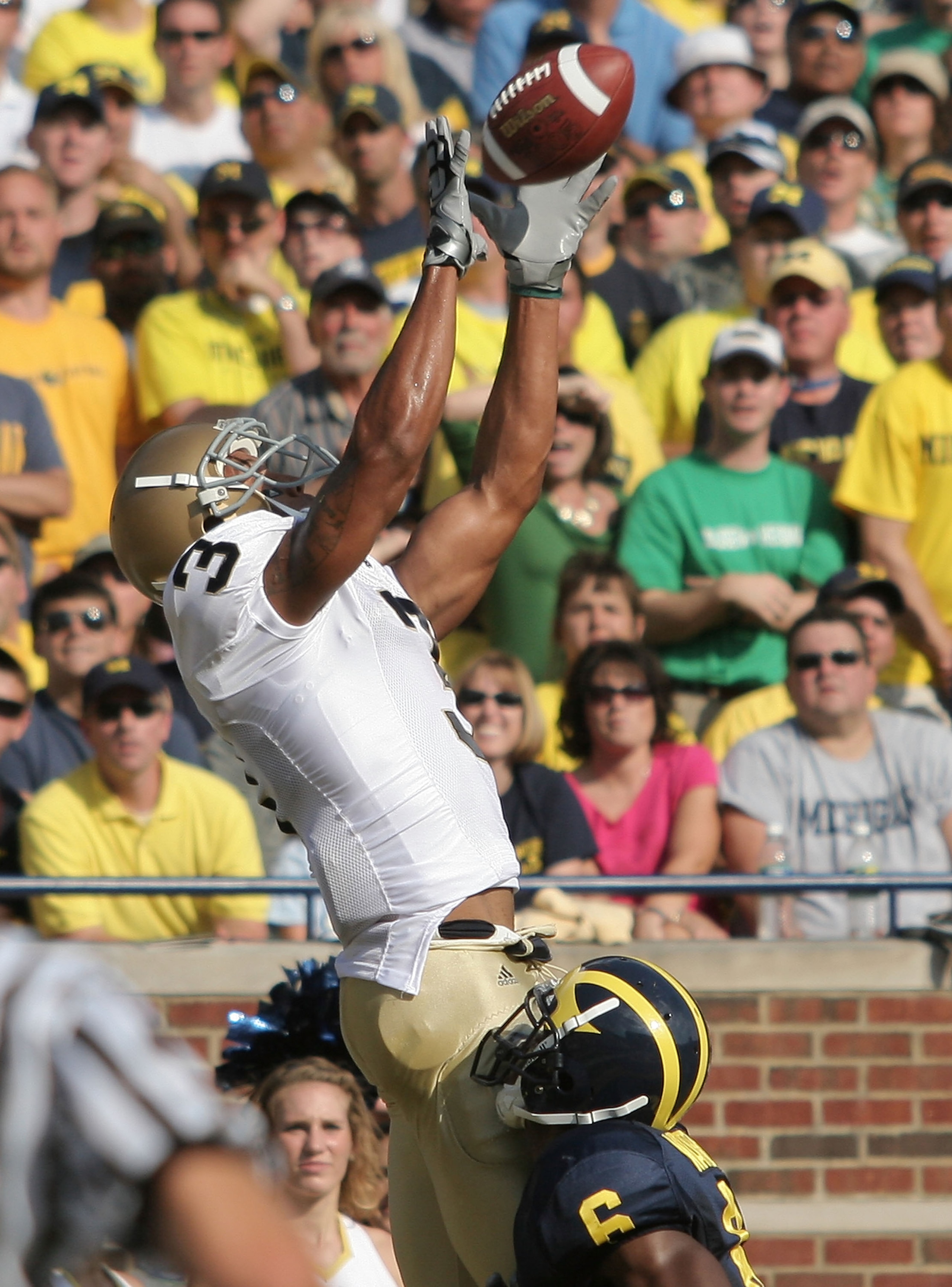 ANN ARBOR, MI - SEPTEMBER 12: Wide reciever Michael Floyd #3 of Notre Dame catches a touchdown pass in the first half to go ahead 17-14 against Michigan at Michigan Stadium on September 12, 2009 in Ann Arbor, Michigan. (Photo by Domenic Centofanti/Getty ANN ARBOR, MI - SEPTEMBER 12: Wide reciever Michael Floyd #3 of Notre Dame catches a touchdown pass in the first half to go ahead 17-14 against Michigan at Michigan Stadium on September 12, 2009 in Ann Arbor, Michigan. (Photo by Domenic Centofanti/Getty