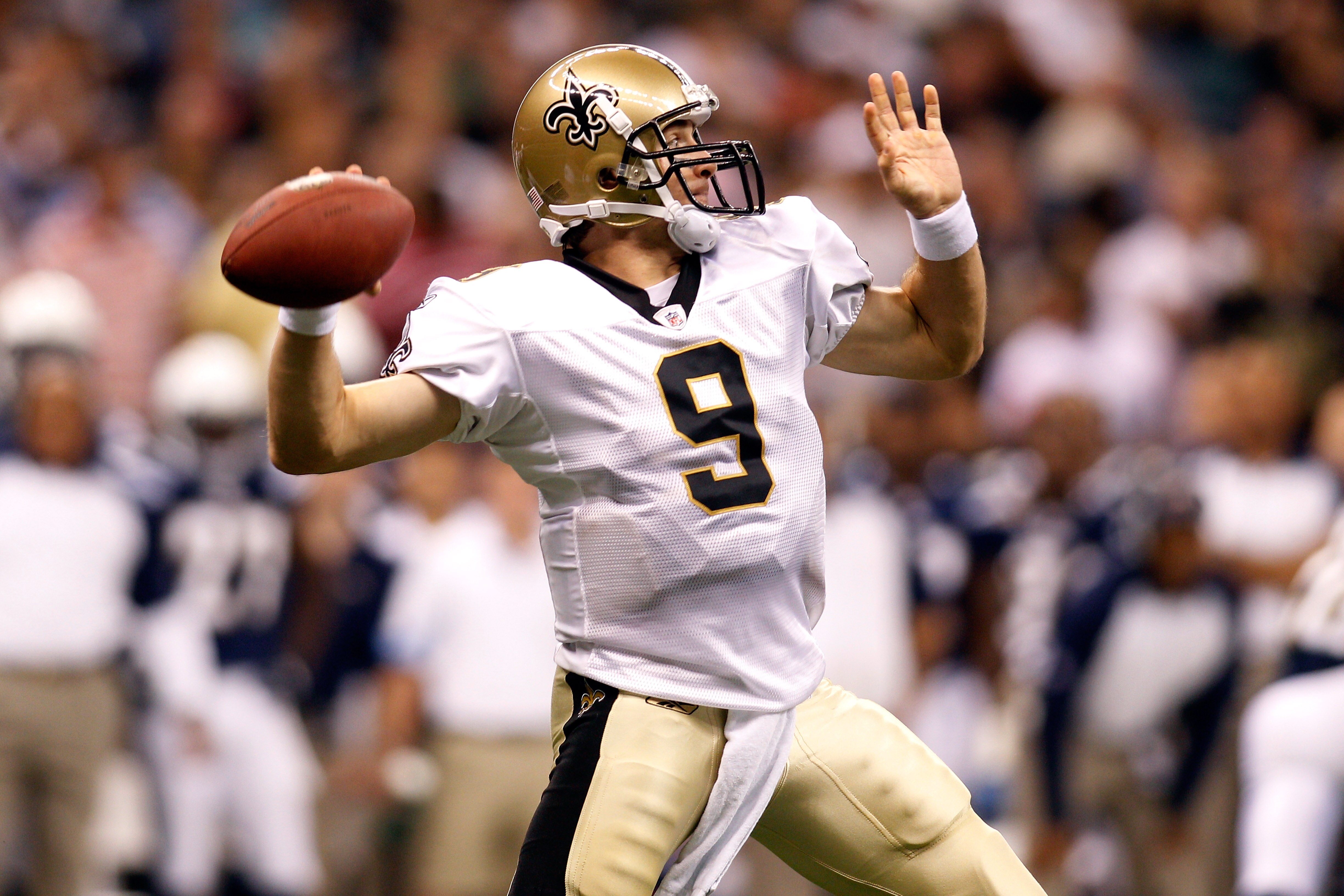 NEW ORLEANS - AUGUST 27:  Drew Brees #9 of the New Orleans Saints throws a pass against the San Diego Chargers at the Louisiana Superdome on August 27, 2010 in New Orleans, Louisiana.  (Photo by Chris Graythen/Getty Images)