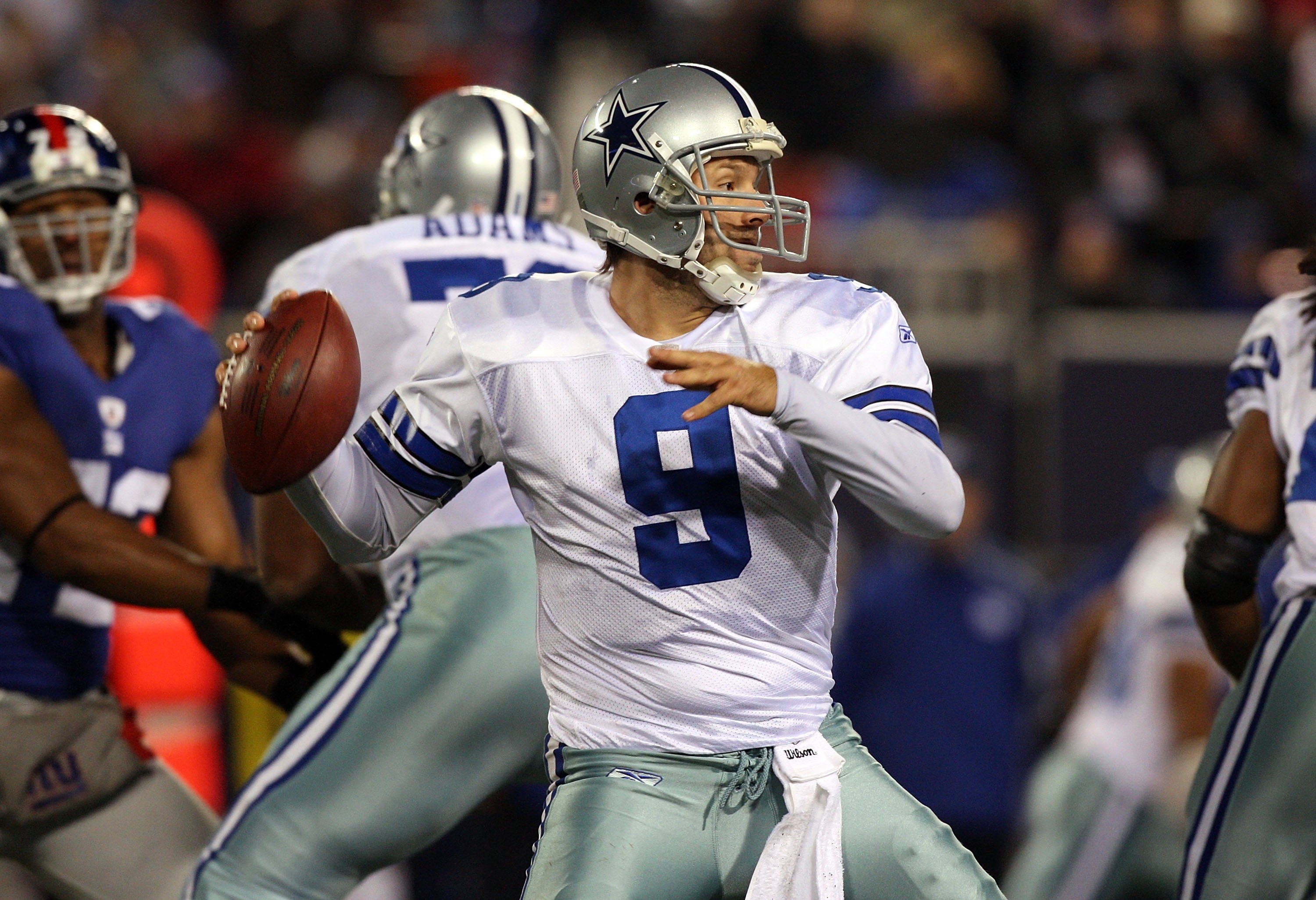 EAST RUTHERFORD, NJ - DECEMBER 06:  Tony Romo #9 of the Dallas Cowboys throws a pass against the New York Giants on December 6, 2009 at Giants Stadium in East Rutherford, New Jersey. The Giants defeated the Cowboys 31-24.  (Photo by Jim McIsaac/Getty Imag