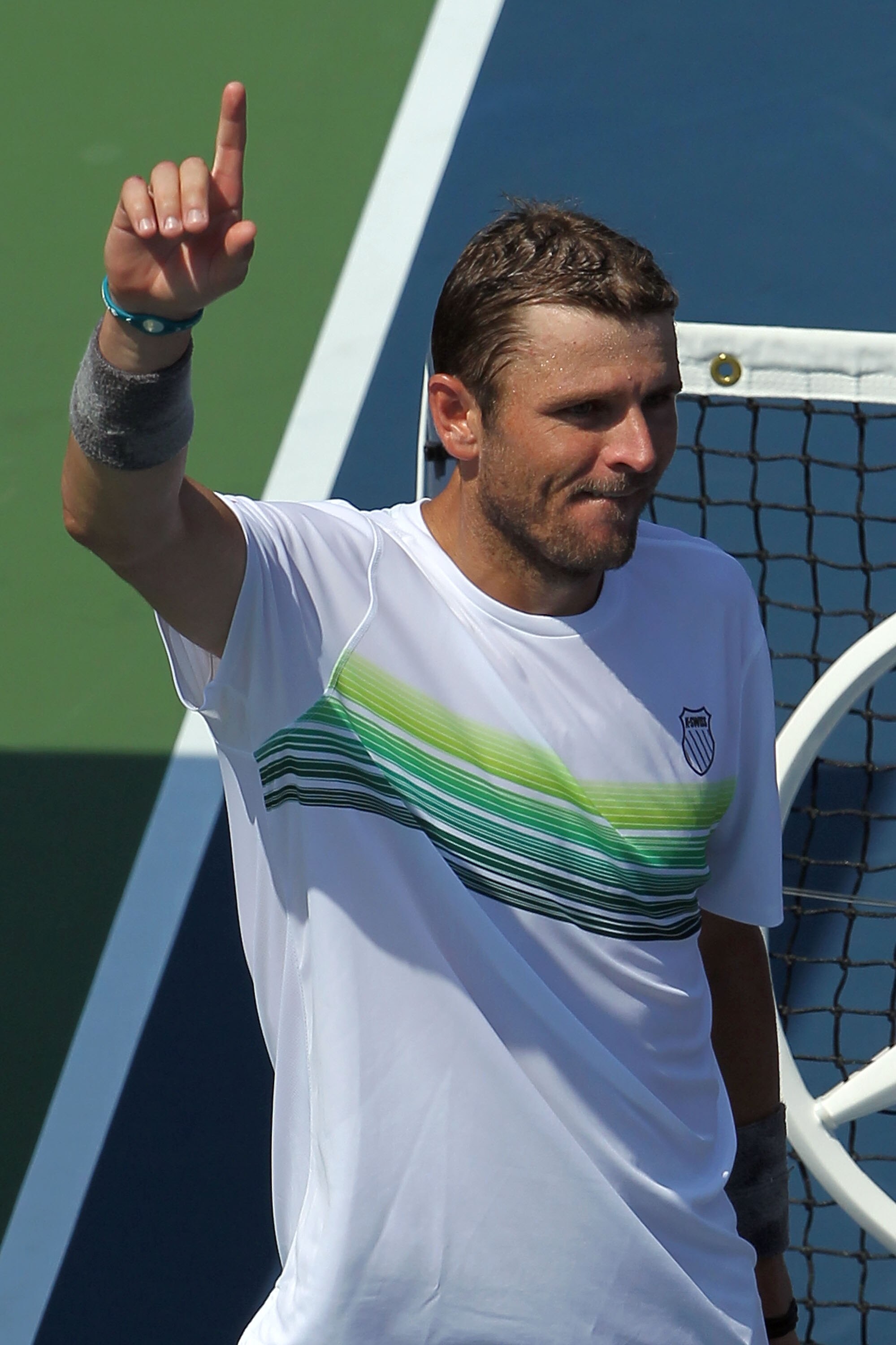 NEW YORK - SEPTEMBER 02:  Mardy Fish of the United States celebrates winning match point against Pablo Cuevas of Uruguay during his men's singles match on day four of the 2010 U.S. Open at the USTA Billie Jean King National Tennis Center on September 2, 2