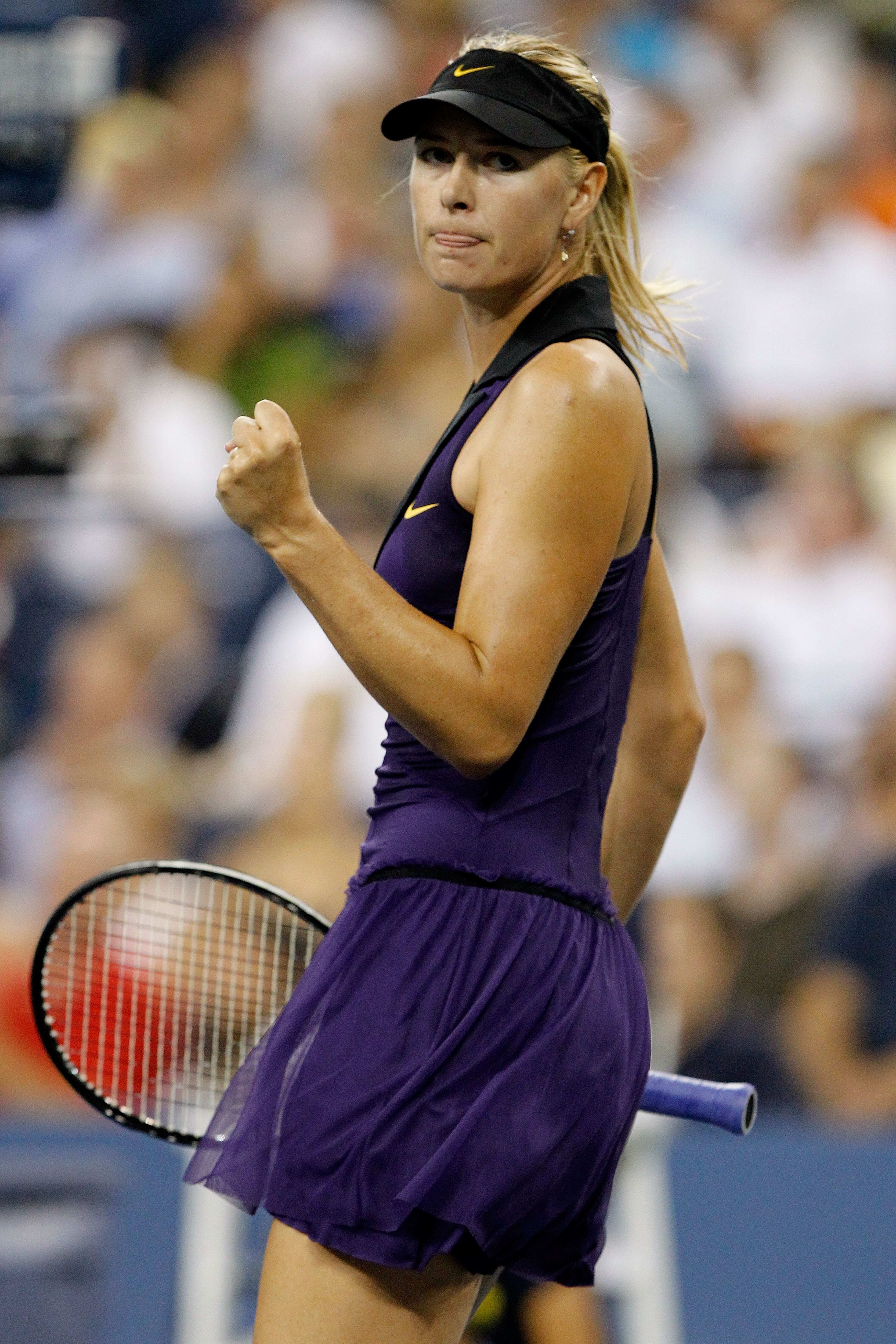 NEW YORK - SEPTEMBER 02:  Maria Sharapova of Russia celebrates defeating Iveta Benesova of the Czech Republic (not pictured) during day four of the 2010 U.S. Open at the USTA Billie Jean King National Tennis Center on September 2, 2010 in the Flushing nei