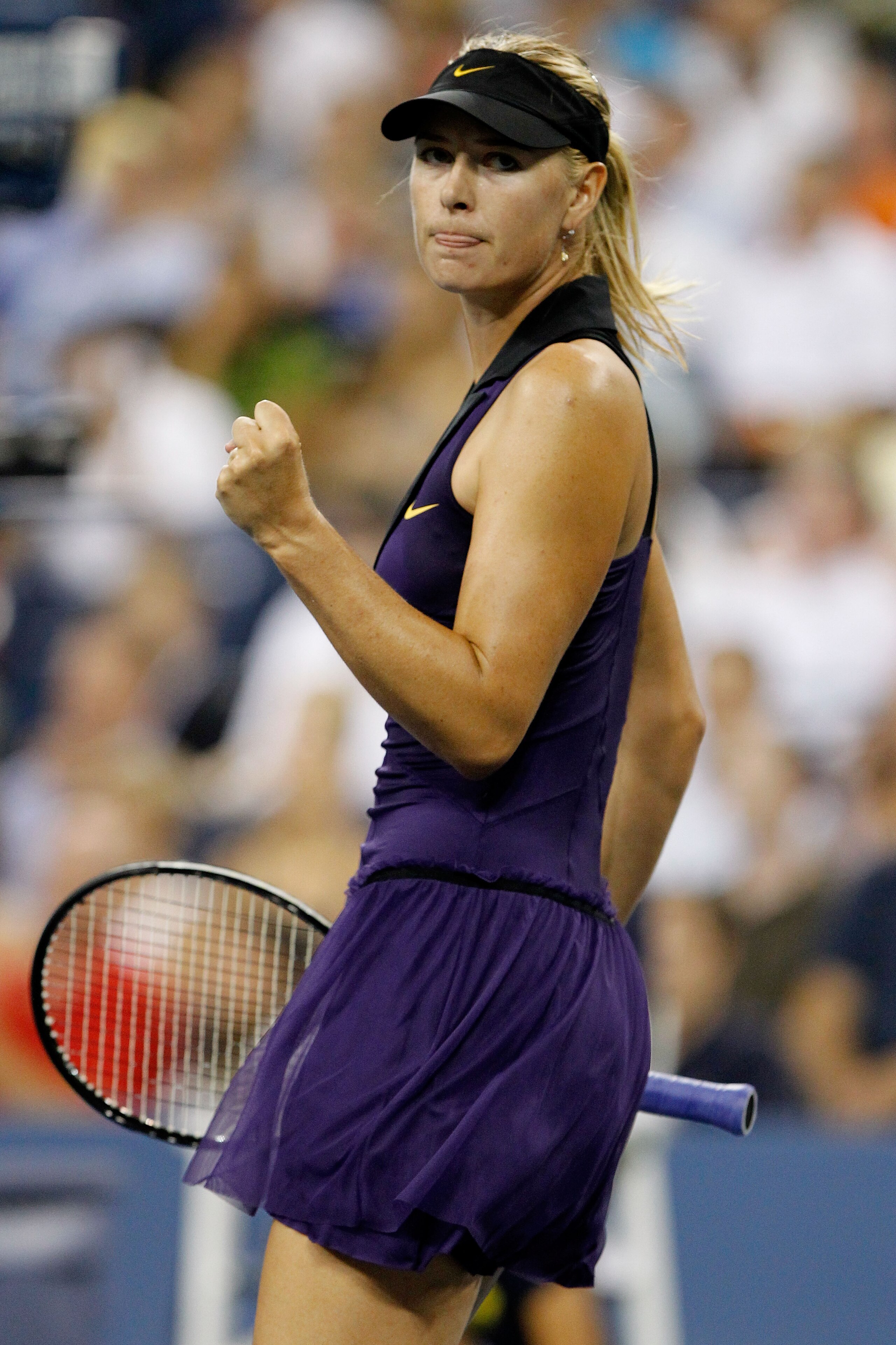 NEW YORK - SEPTEMBER 02:  Maria Sharapova of Russia celebrates defeating Iveta Benesova of the Czech Republic (not pictured) during day four of the 2010 U.S. Open at the USTA Billie Jean King National Tennis Center on September 2, 2010 in the Flushing nei