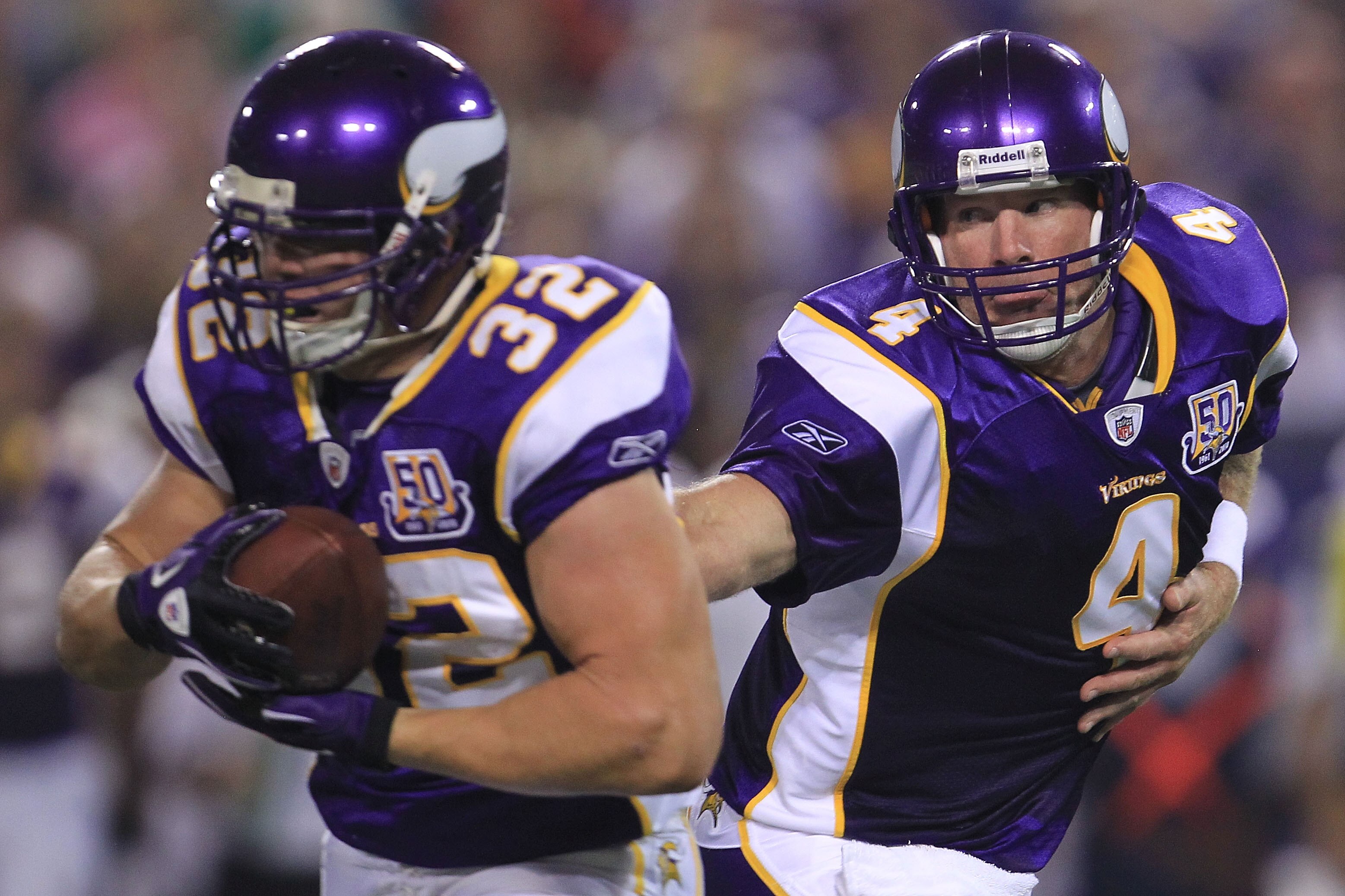 MINNEAPOLIS - AUGUST 28:  Brett Favre #4 of the Minnesota Vikings hands off to Toby Gerhart #32 against the Seattle Seahawks during a preseason NFL game at Mall of America Field at the Hubert H. Humphrey Metrodome on August 28, 2010  in Minneapolis, Minne