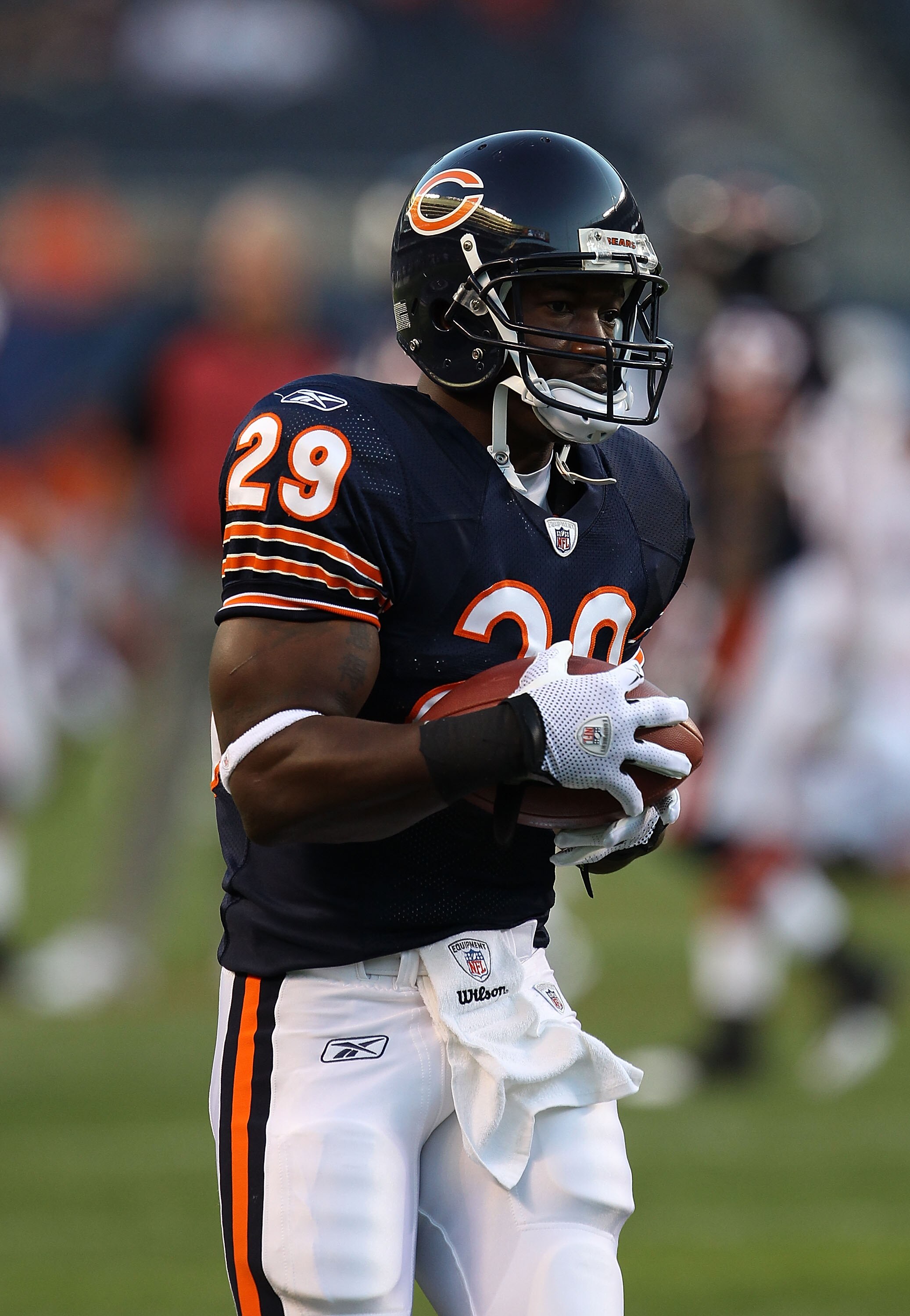 CHICAGO - AUGUST 28: Chester Taylor #29 of the Chicago Bears participates in warm-ups before a preseason game against the Arizona Cardinals at Soldier Field on August 28, 2010 in Chicago, Illinois. The Cardinals defeated the Bears 14-9. (Photo by Jonathan