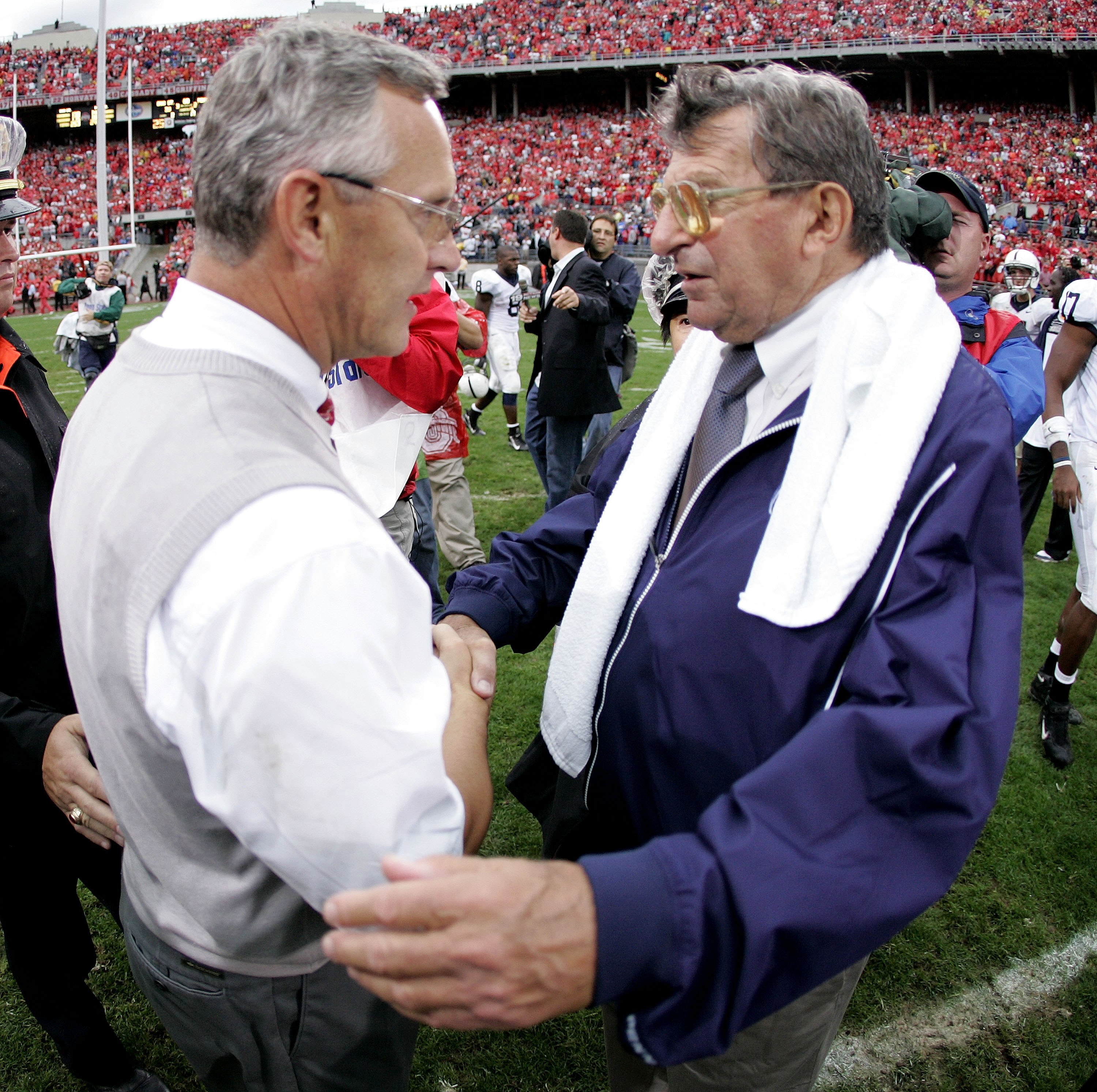COLUMBUS, OH - SEPTEMBER 23:  Jim Tressel head coach of the Ohio State Buckeyes shakes hands after a 28-6 victory with Joe Paterno, head coach of the Penn State Nittany Lions, on September 23, 2006 at Ohio Stadium in Columbus, Ohio. (Photo by Gregory Sham