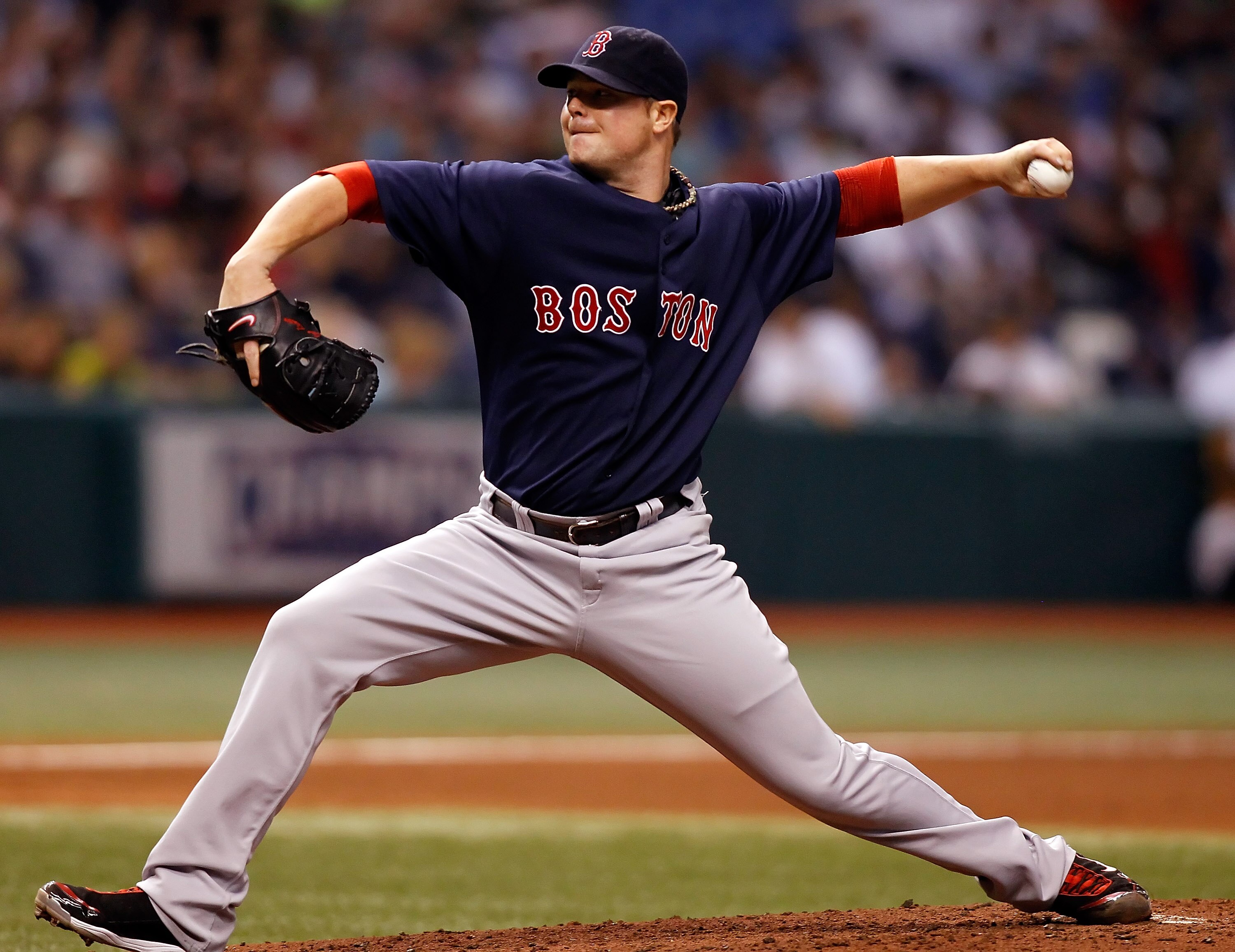 ST PETERSBURG, FL - AUGUST 27:  Pitcher Jon Lester #31 of the Boston Red Sox pitches against the Tampa Bay Rays during the game at Tropicana Field on August 27, 2010 in St. Petersburg, Florida.  (Photo by J. Meric/Getty Images)