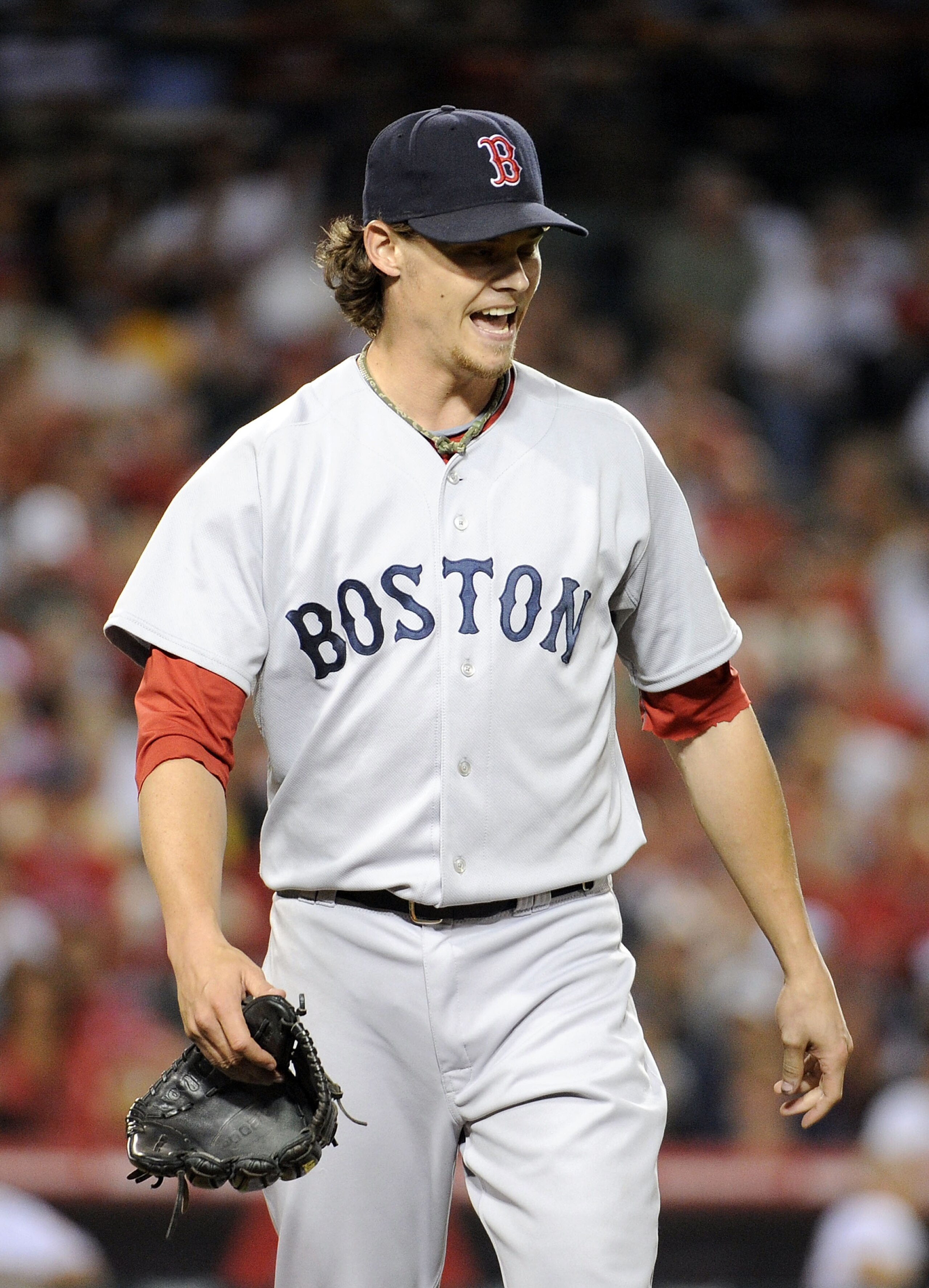 ANAHEIM, CA - JULY 26:  Clay Buchholz #11 of the Boston Red Sox reacts to the third out of the Los Angeles Angels during the seventh inning at Angel Stadium on July 26, 2010 in Anaheim, California.  (Photo by Harry How/Getty Images)