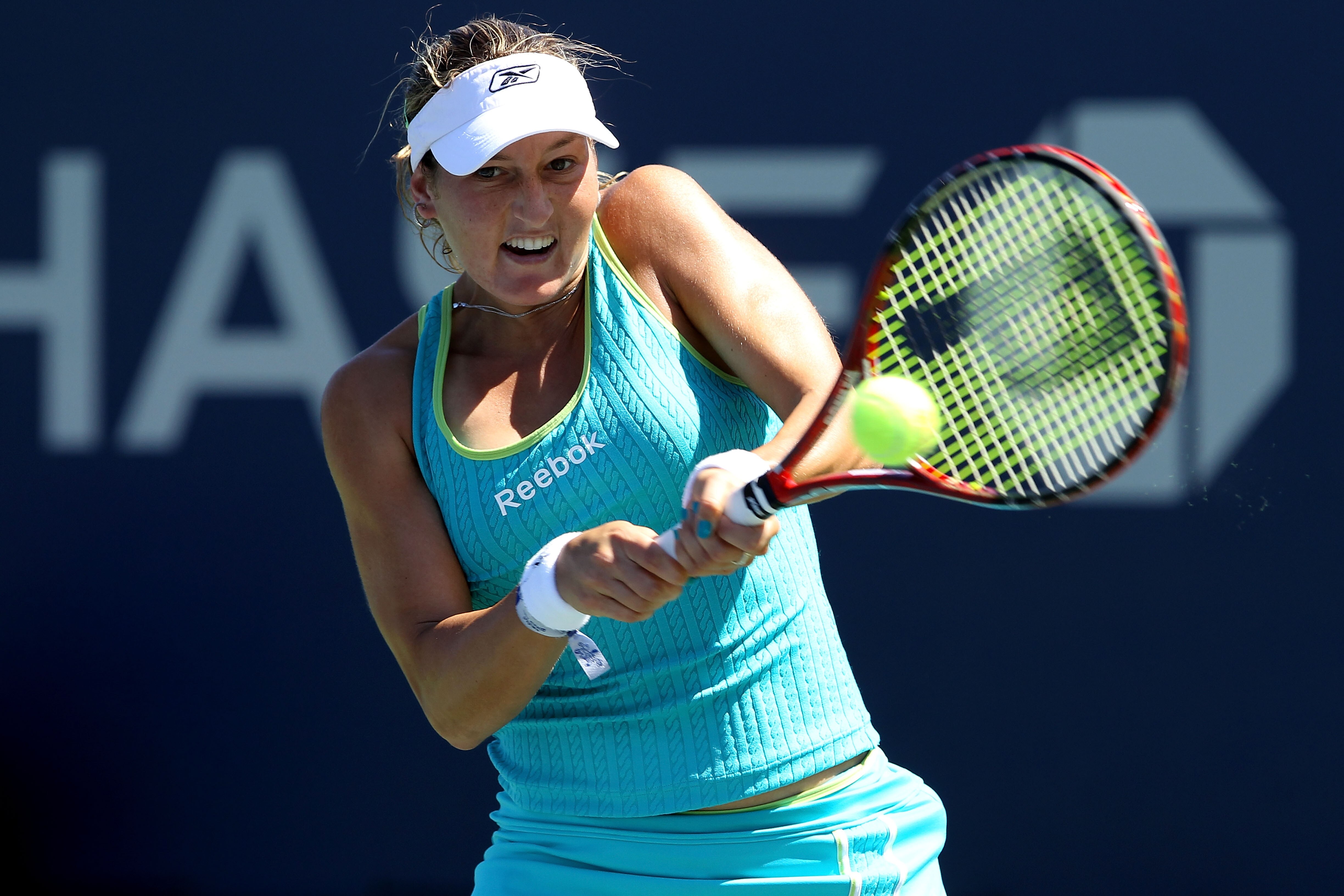 NEW YORK - AUGUST 30:  Shahar Peer of Israel returns a shot against Jelena Kostanic Tosic of Croatia during the Women's Singles first round match on day one of the 2010 U.S. Open at the USTA Billie Jean King National Tennis Center on August 30, 2010 in th