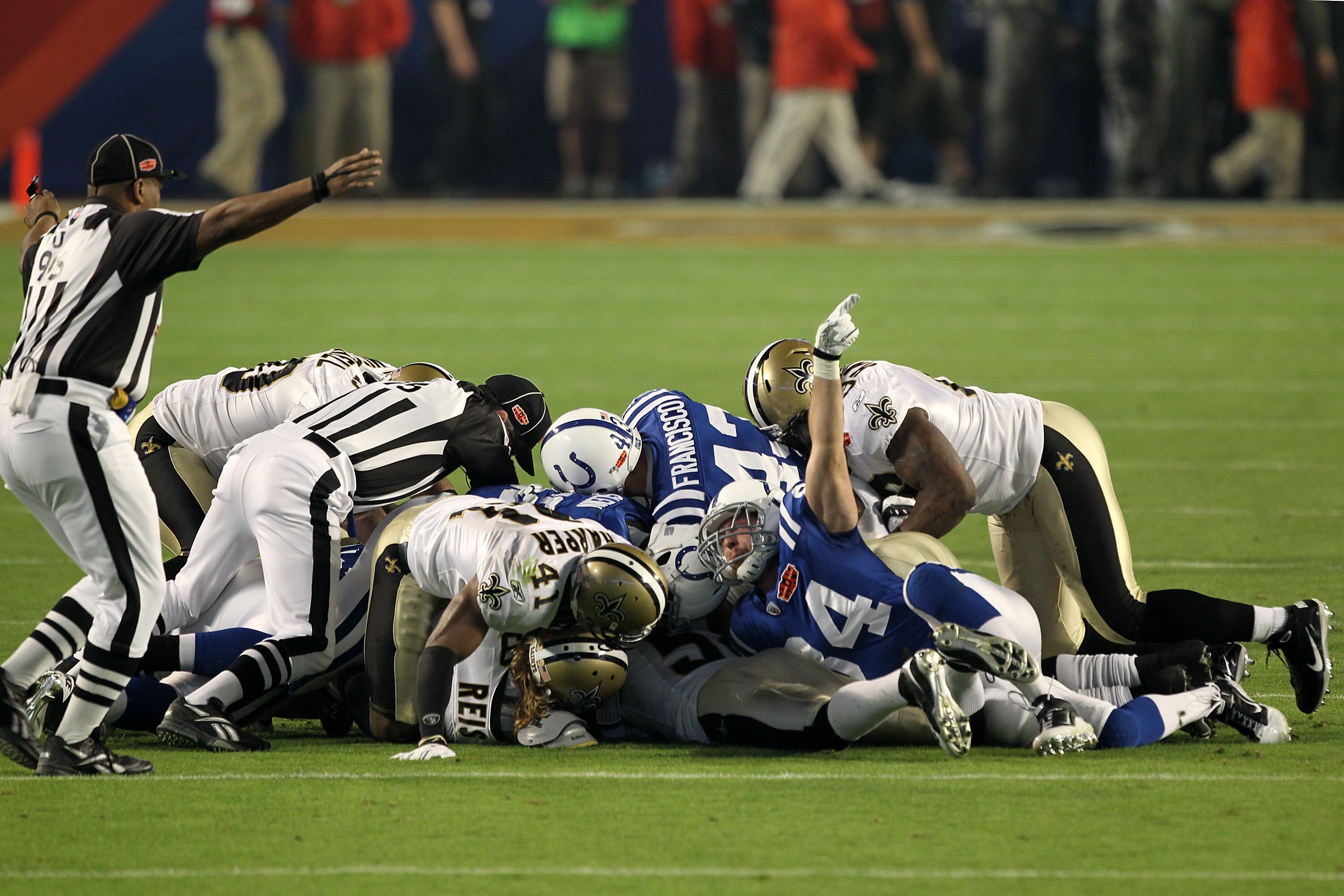 MIAMI GARDENS, FL - FEBRUARY 07:  The Indianapolis Colts fights for a loose ball against the New Orleans Saints after an onside kick to start the second half during Super Bowl XLIV on February 7, 2010 at Sun Life Stadium in Miami Gardens, Florida.  (Photo