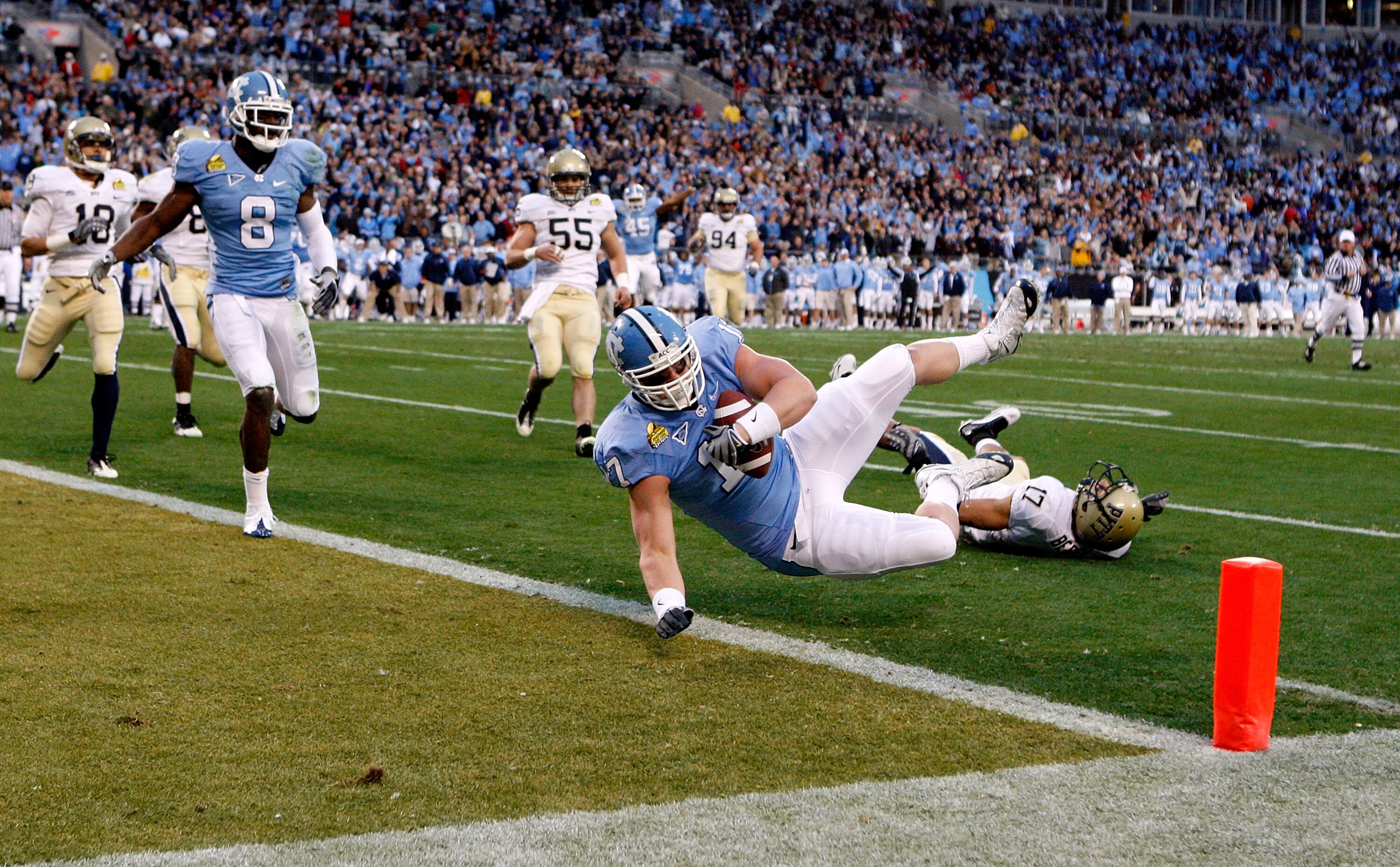 CHARLOTTE, NC - DECEMBER 26:  Aaron Berry #17 of the Pittsburgh Panthers misses a tackle on Zack Pinalto #17 of the North Carolina Tar Heels during their game on December 26, 2009 in Charlotte, North Carolina.  (Photo by Streeter Lecka/Getty Images)