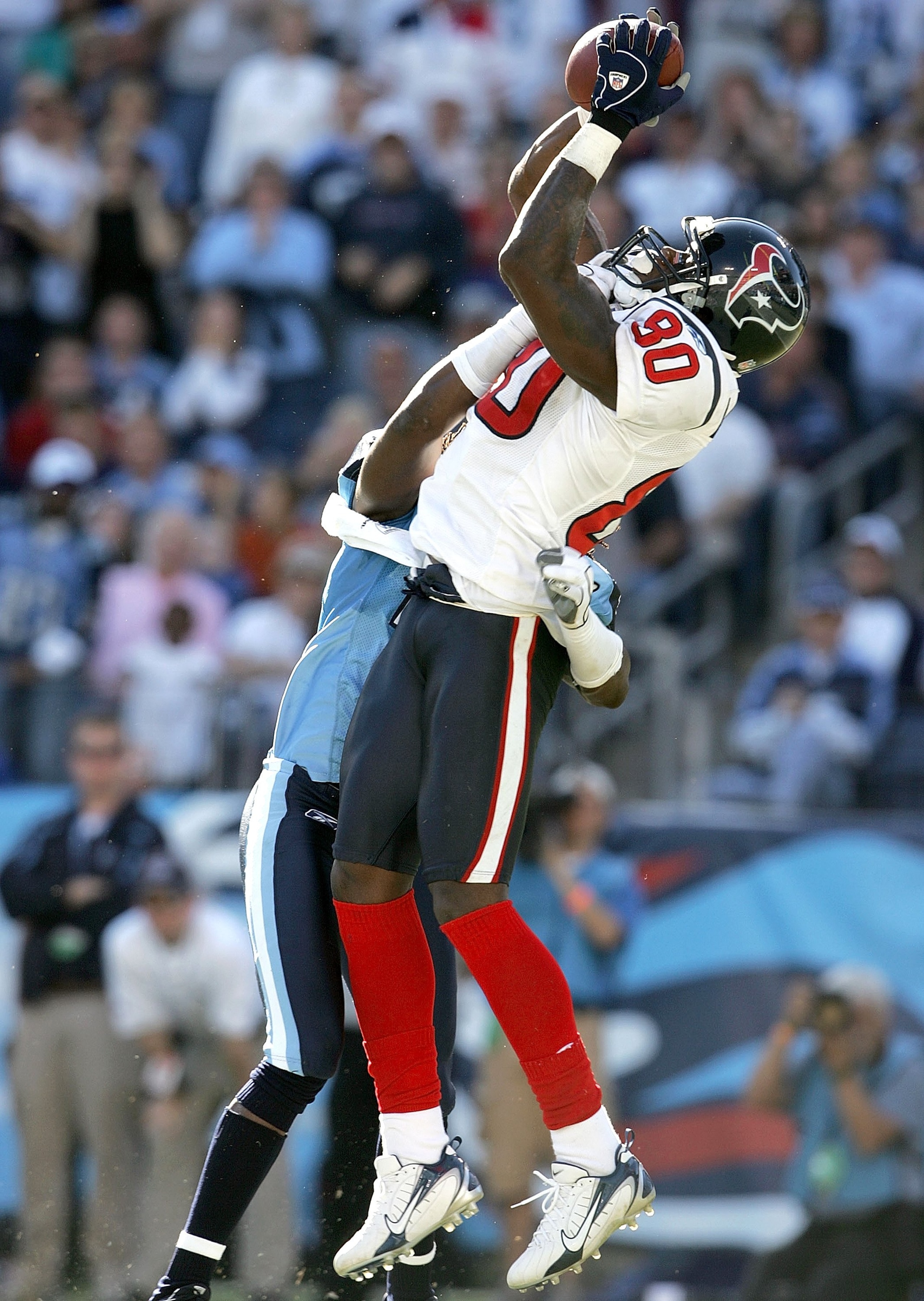 MEMPHIS, TN - OCTOBER 29:  Andre Johnson #80 of the Houston Texans catches a touchdown pass during the NFL game against the Tennessee Titans on October 29, 2006 at LP Field in Nashville, Tennessee.  (Photo by Andy Lyons/Getty Images)