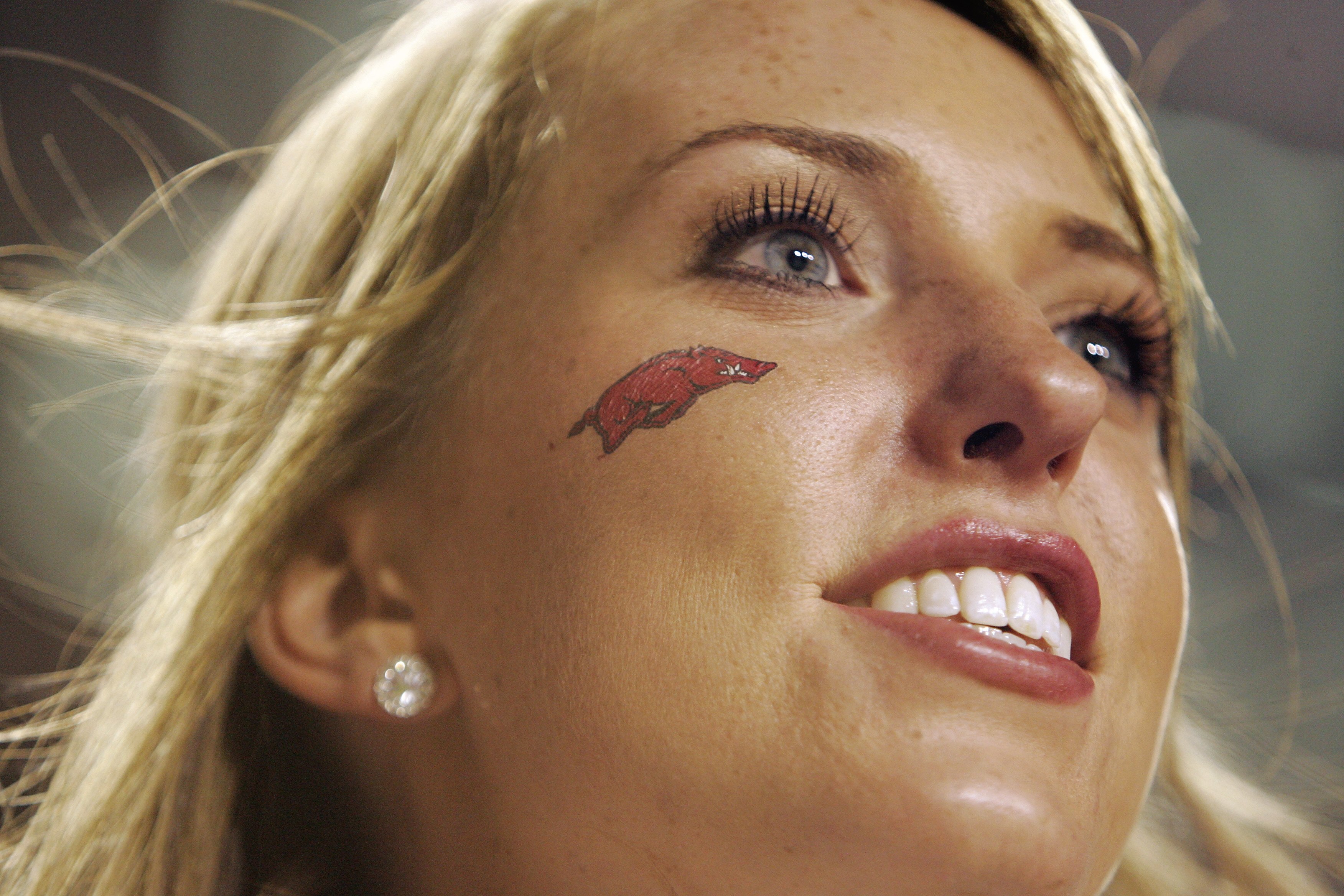 FAYETTEVILLE, AR - SEPTEMBER 02:  An Arkansas Razorbacks' cheerleader watches a game against the University of Southern California Trojans on September 2, 2006 at Donald W. Reynolds Razorback Stadium in Fayetteville, Arkansas.  The Trojans won 50-14.  (Ph