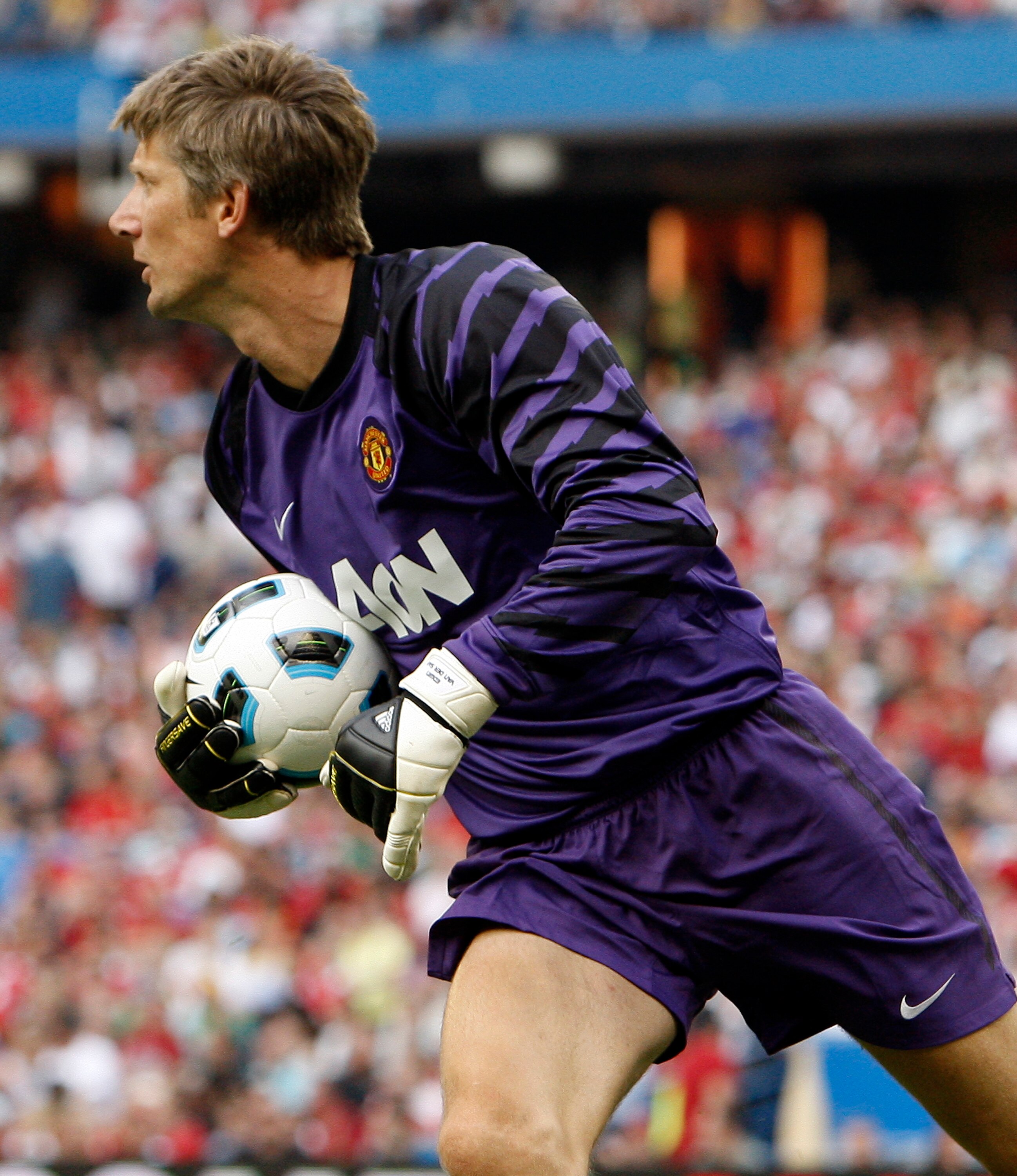 TORONTO - JULY 16: Edwin van der Sar #1 of Manchester United moves the ball against Celtic F.C. during a friendly match at the Rogers Centre July 16, 2010 in Toronto, Ontario, Canada. Manchester United won 3-1.  (Photo by Abelimages/Getty Images)