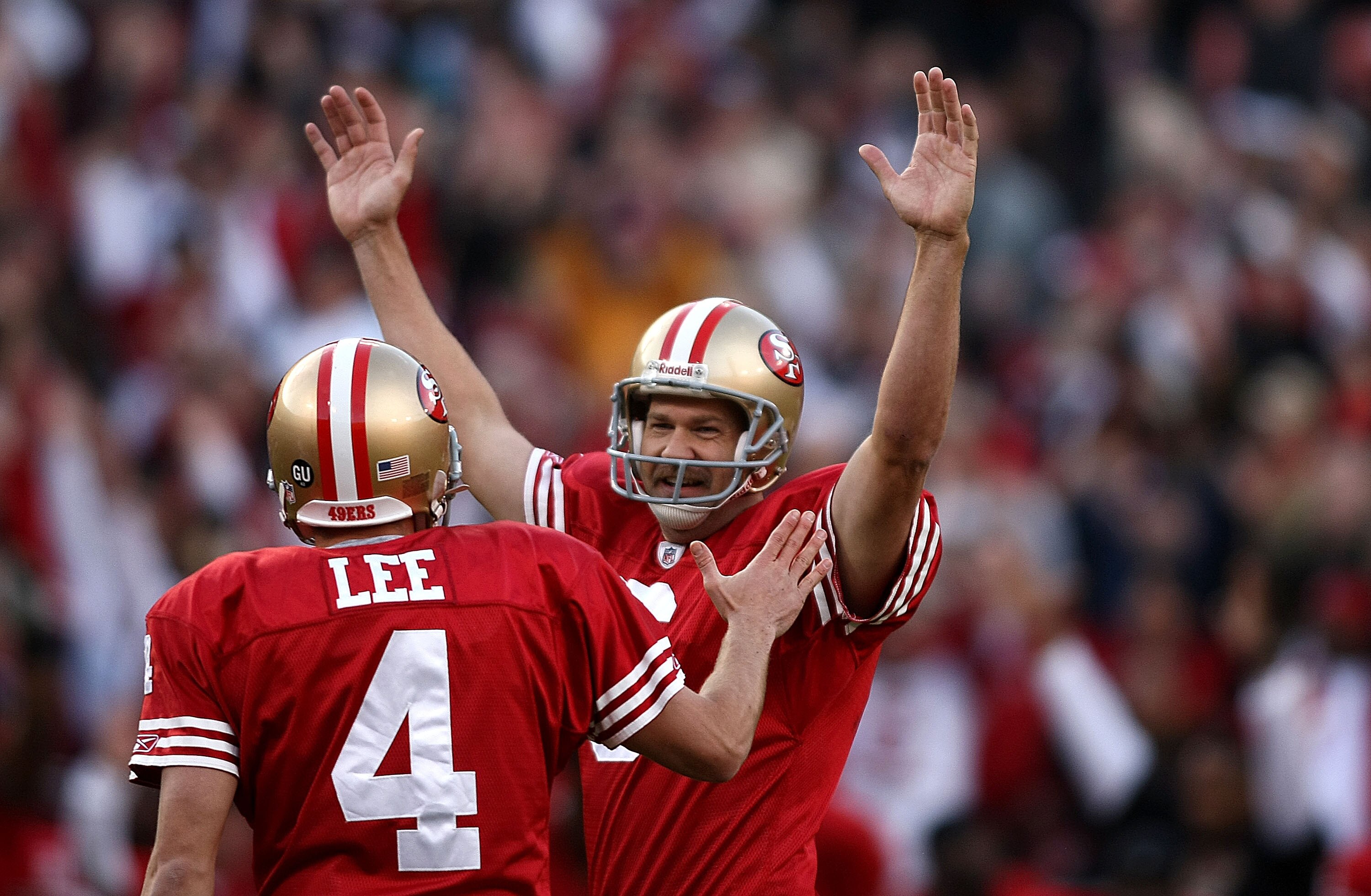 SAN FRANCISCO - DECEMBER 28:  Kicker Joe Nedney #6 of the San Francisco 49ers celebrates with Andy Lee #4 after kicking the game winning feild goal as time expired to defeat the Washington Redskins 27-24 at Candlestick Park on December 28, 2008 in San Fra