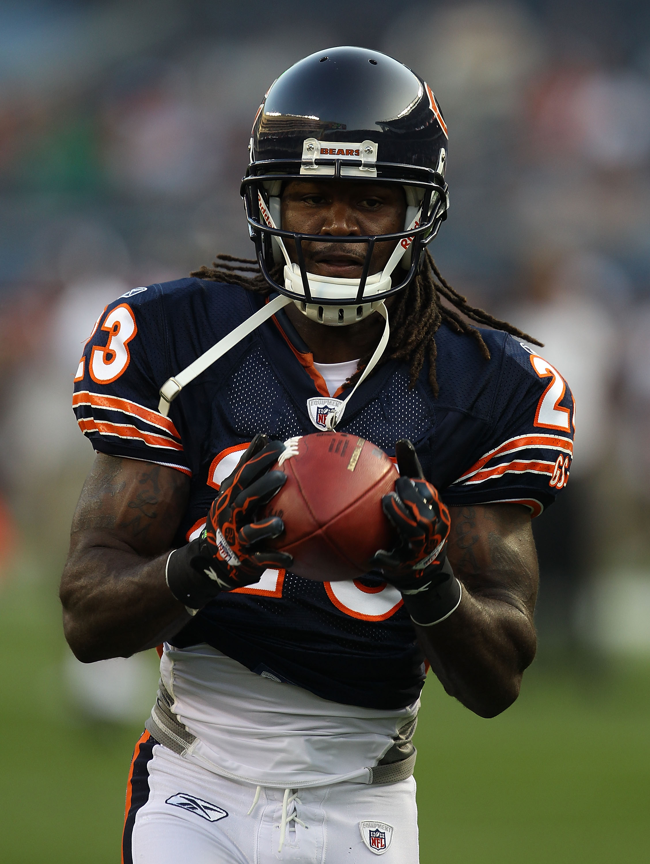 CHICAGO - AUGUST 21: Devin Hester #23 of the Chicago Bears catches a pass during warm-ups before a preseason game against the Oakland Raiders at Soldier Field on August 21, 2010 in Chicago, Illinois. The Raiders defeated the Bears 32-17. (Photo by Jonatha