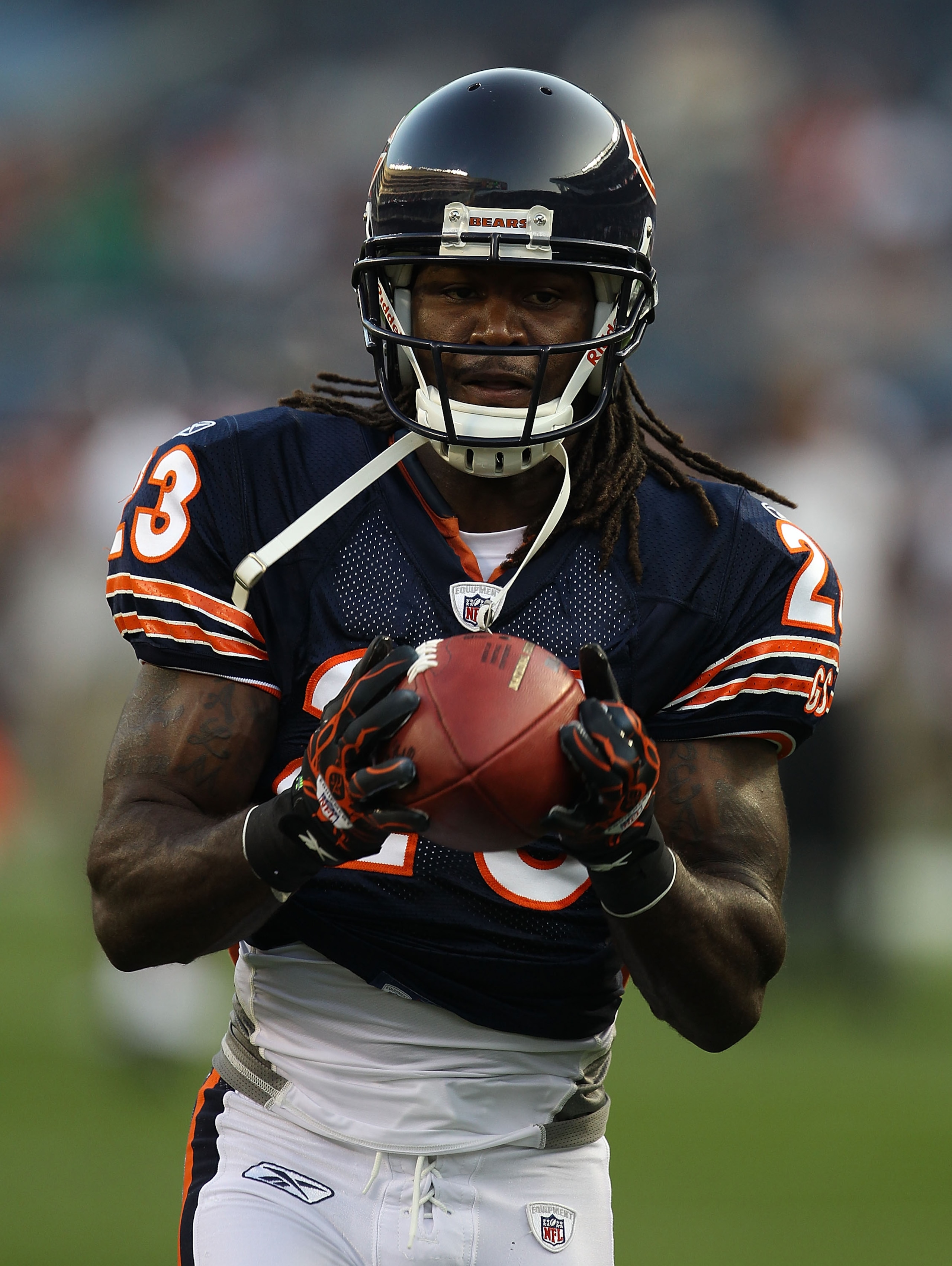 CHICAGO - AUGUST 21: Devin Hester #23 of the Chicago Bears catches a pass during warm-ups before a preseason game against the Oakland Raiders at Soldier Field on August 21, 2010 in Chicago, Illinois. The Raiders defeated the Bears 32-17. (Photo by Jonatha