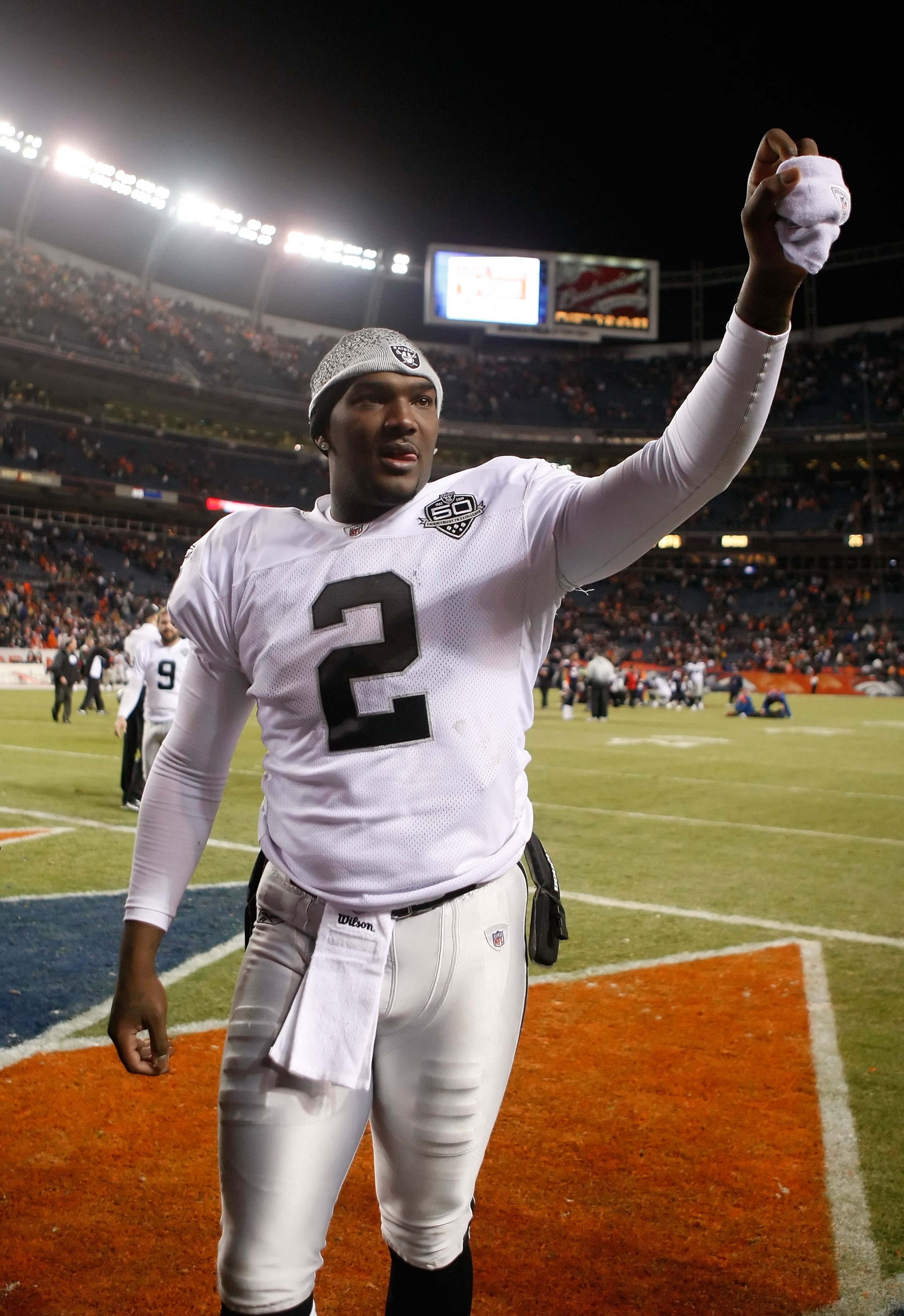 DENVER - DECEMBER 20:  Quarterback JaMarcus Russell #2 celebrates following the Oakland Raiders' victory over the Denver Broncos at Invesco Field at Mile High on December 20, 2009 in Denver, Colorado. The Raiders defeated the Broncos 20-19.  (Photo by Jef