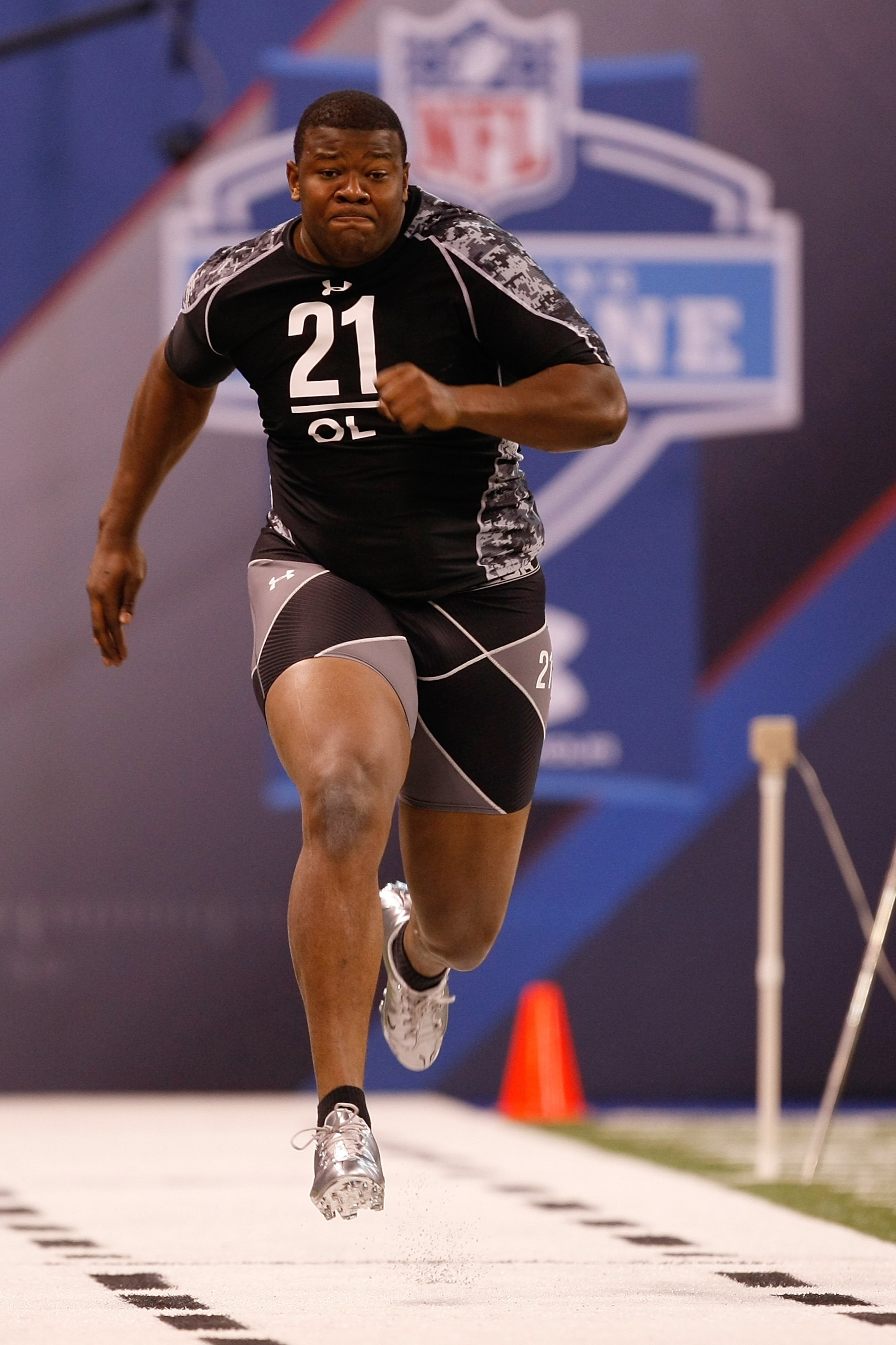 INDIANAPOLIS, IN - FEBRUARY 27: Offensive lineman John Jerry of Mississippi runs the 40 yard dash during the NFL Scouting Combine presented by Under Armour at Lucas Oil Stadium on February 27, 2010 in Indianapolis, Indiana. (Photo by Scott Boehm/Getty Ima