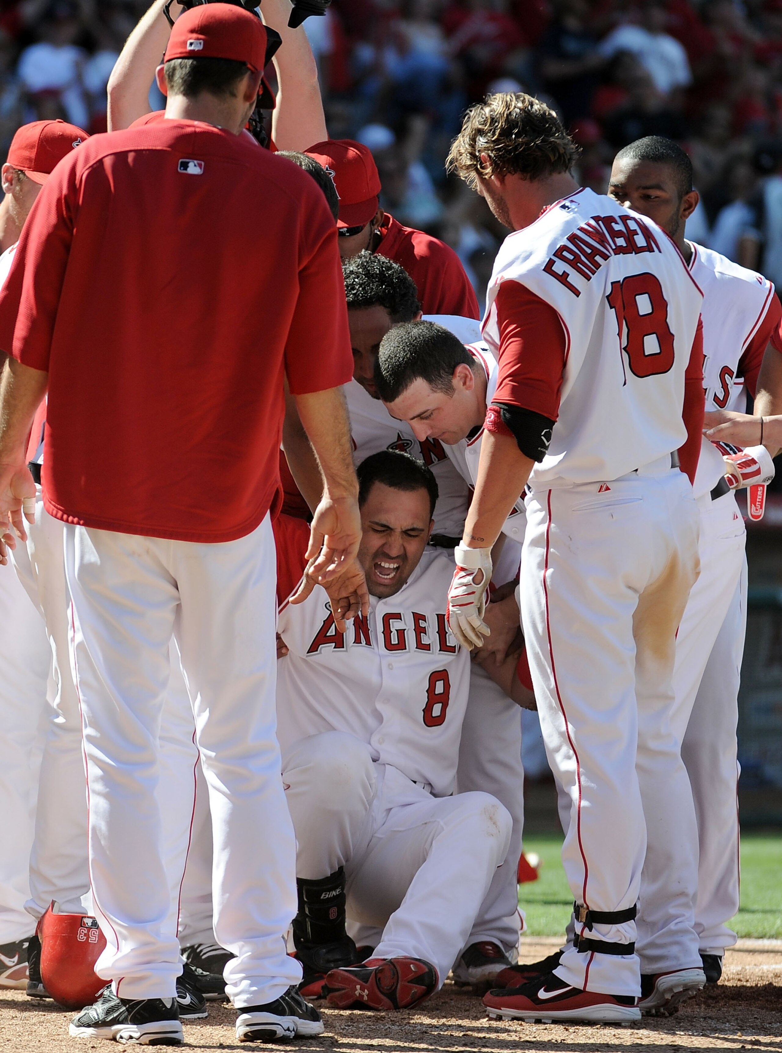 ANAHEIM, CA - MAY 29:  Kendry Morales #8 of the Los Angeles Angels reacts to his injury on his way to home plate after his grand slam homerun to win the game 5-1 over the Seattle Mariners during the bottom of the ninth inning at Angel Stadium on May 29, 2