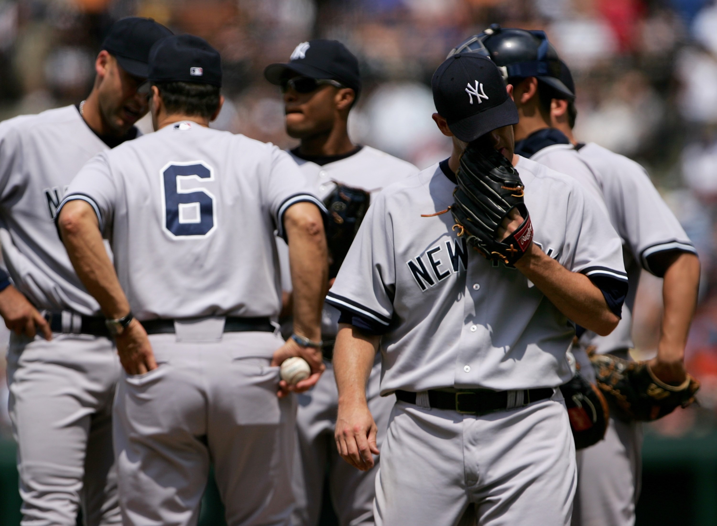 BALTIMORE - JUNE 04:  Starting pitcher Aaron Small #31 of the New York Yankees leaves the mound after being pulled by manager Joe Torre #6 in the third inning against the Baltimore Orioles as he collected the loss at Oriole Park at Camden Yards on June 4,
