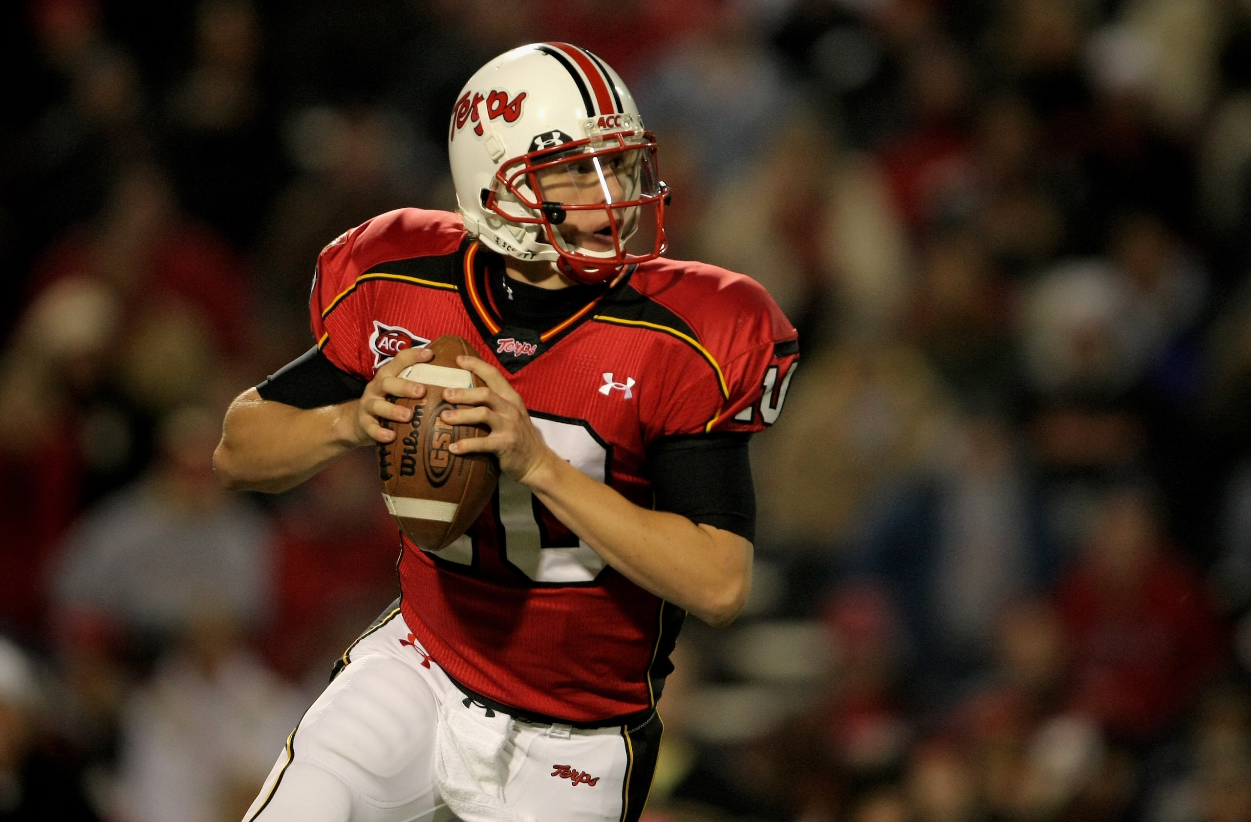 COLLEGE PARK, MD - NOVEMBER 10:  Quarterback Chris Turner #10 of the Maryland Terrapins rolls out and looks for a receiver against the Boston College Eagles at Byrd Stadium on November 10, 2007 in College Park, Maryland. (Photo by Doug Pensinger/Getty Ima