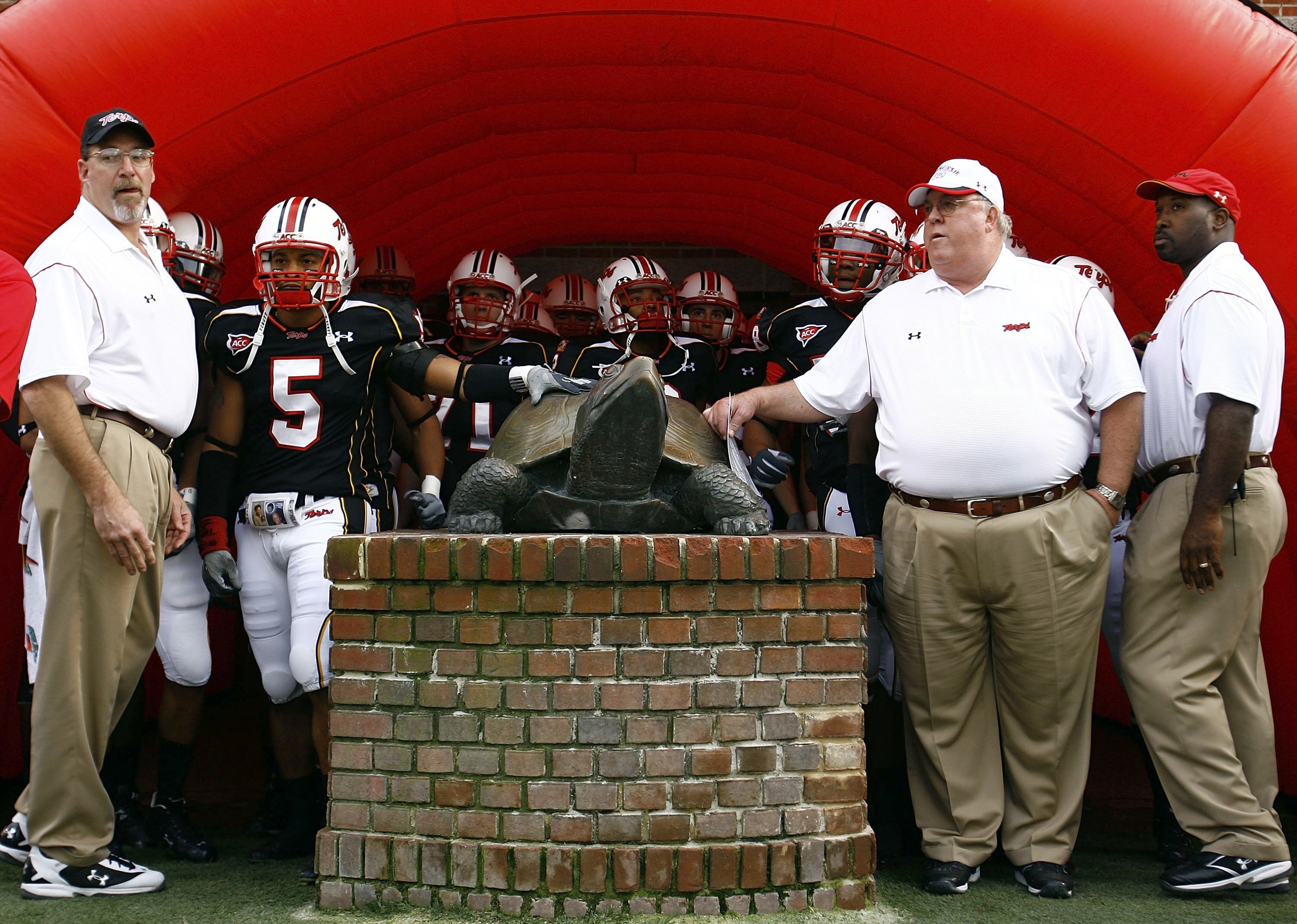 COLLEGE PARK, MD - NOVEMBER 11:  Head coach Ralph Friedgen of the Maryland Terrapins leads his team out of the locker room prior to the game against the Miami Hurricanes on November 11, 2006 at Byrd Stadium in College Park, Maryland.  (Photo by Jamie Squi