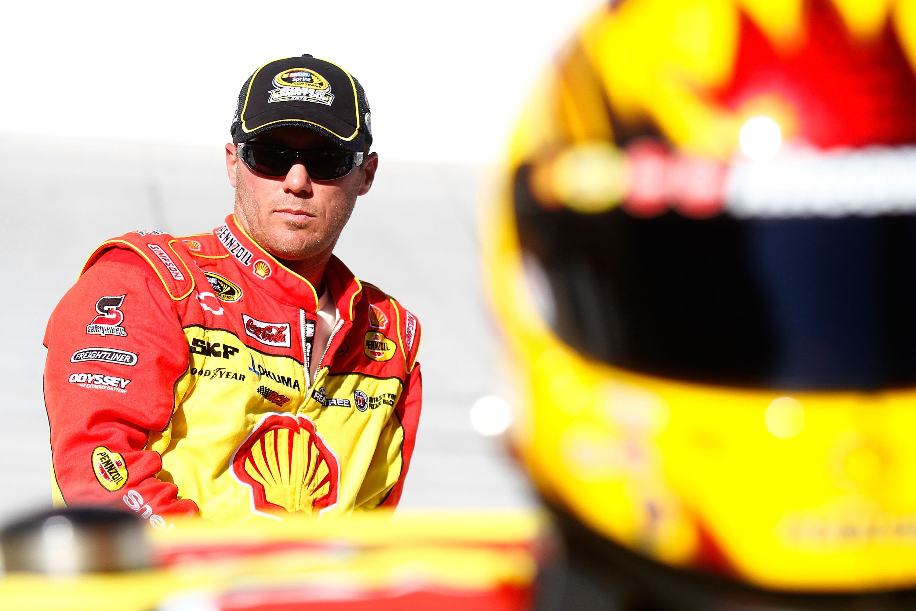 BRISTOL, TN - AUGUST 20:  Kevin Harvick, driver of the #29 Shell/Pennzoil Chevrolet, stands on the grid during qualifying for the NASCAR Sprint Cup Series IRWIN Tools Night Race at Bristol Motor Speedway on August 20, 2010 in Bristol, Tennessee.  (Photo b