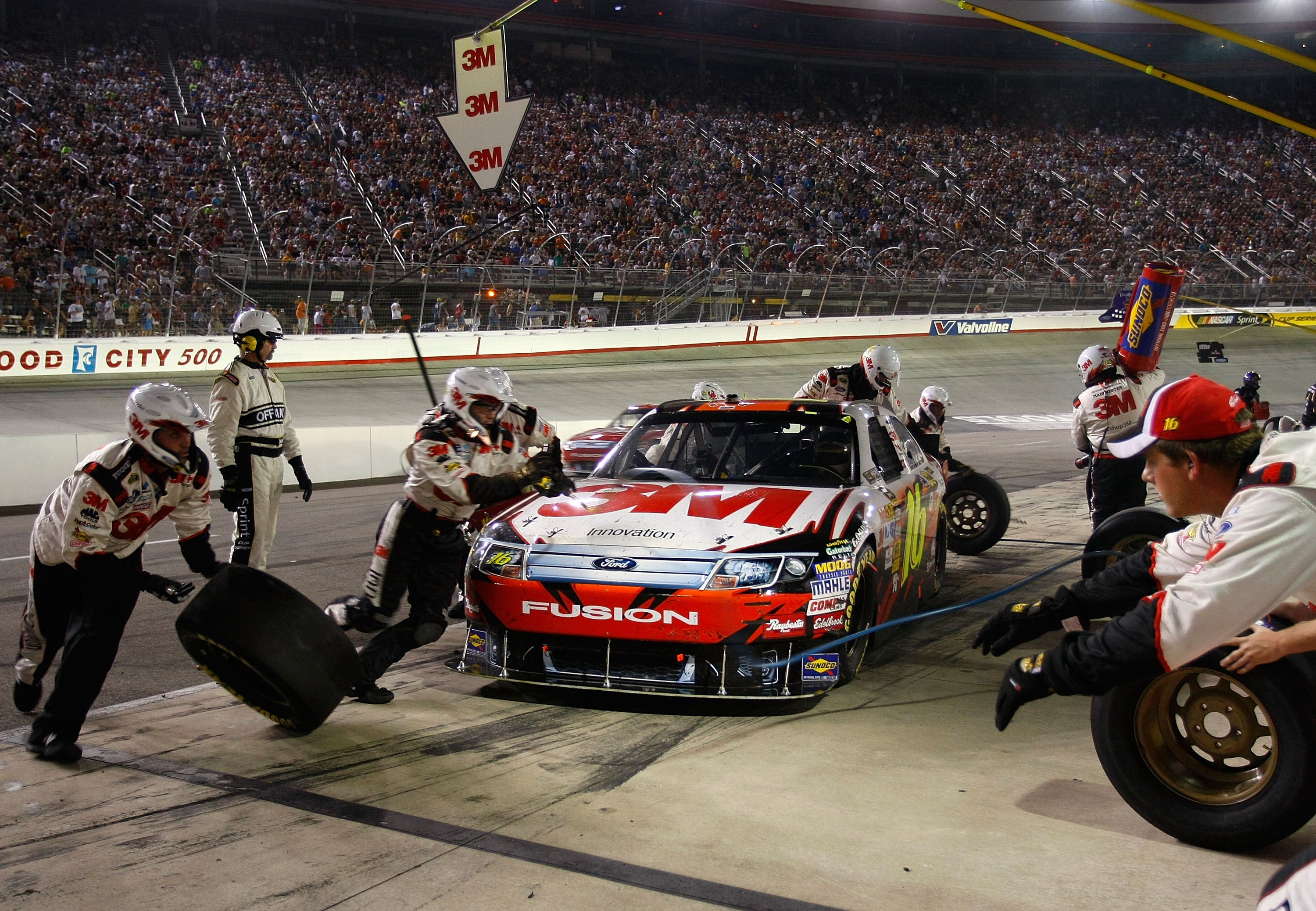 BRISTOL, TN - AUGUST 21:  Greg Biffle, driver of the #16 3M Ford, pits during the NASCAR Sprint Cup Series IRWIN Tools Night Race at Bristol Motor Speedway on August 21, 2010 in Bristol, Tennessee.  (Photo by Geoff Burke/Getty Images for NASCAR)
