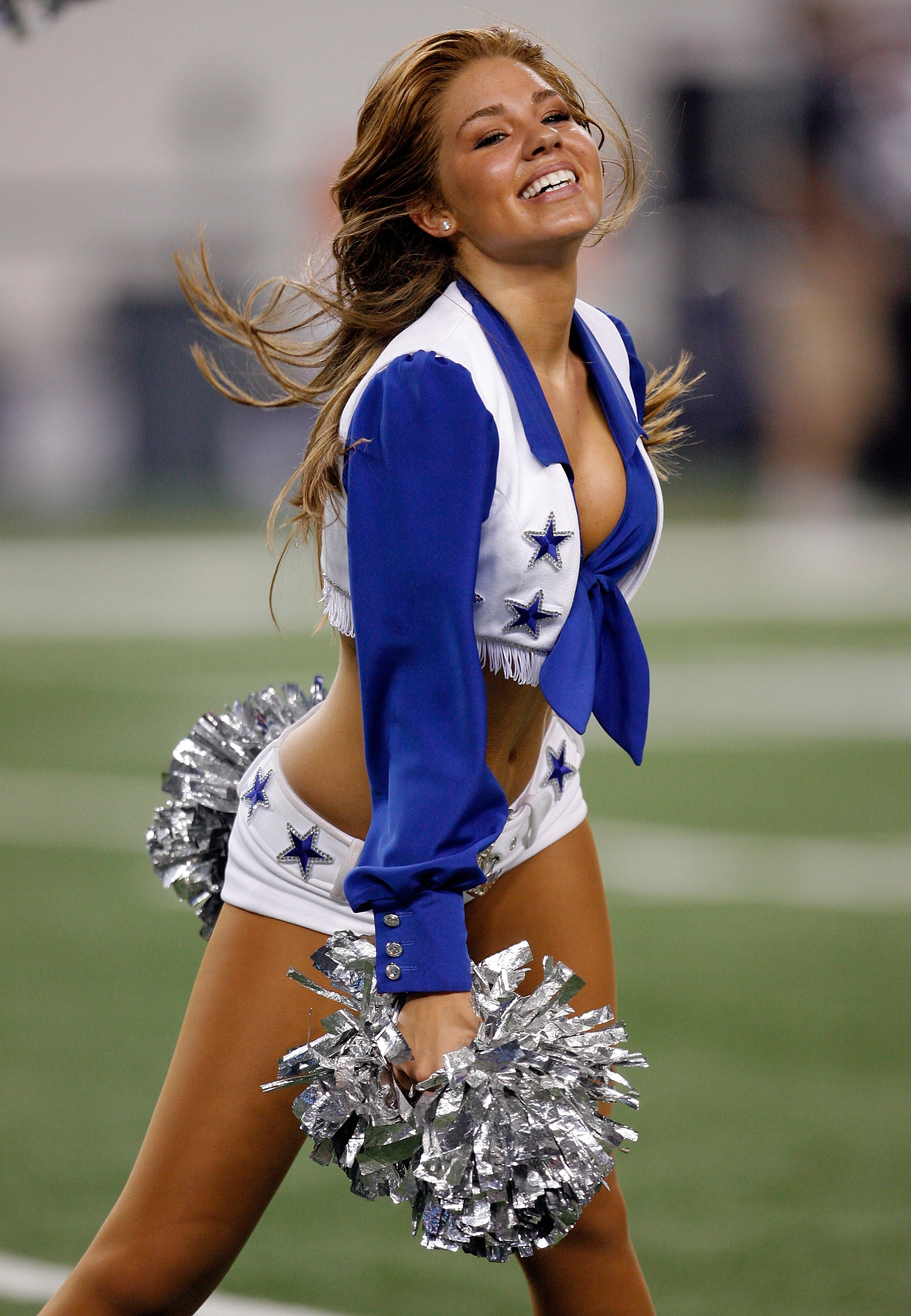 ARLINGTON, TX - AUGUST 12: The Dallas Cowboys Cheerleaders perform during the preseason game between the Dallas Cowboys and Oakland Raiders at the Dallas Cowboys Stadium on August 12, 2010 in Arlington, Texas. (Photo by Tom Pennington/Getty Images)