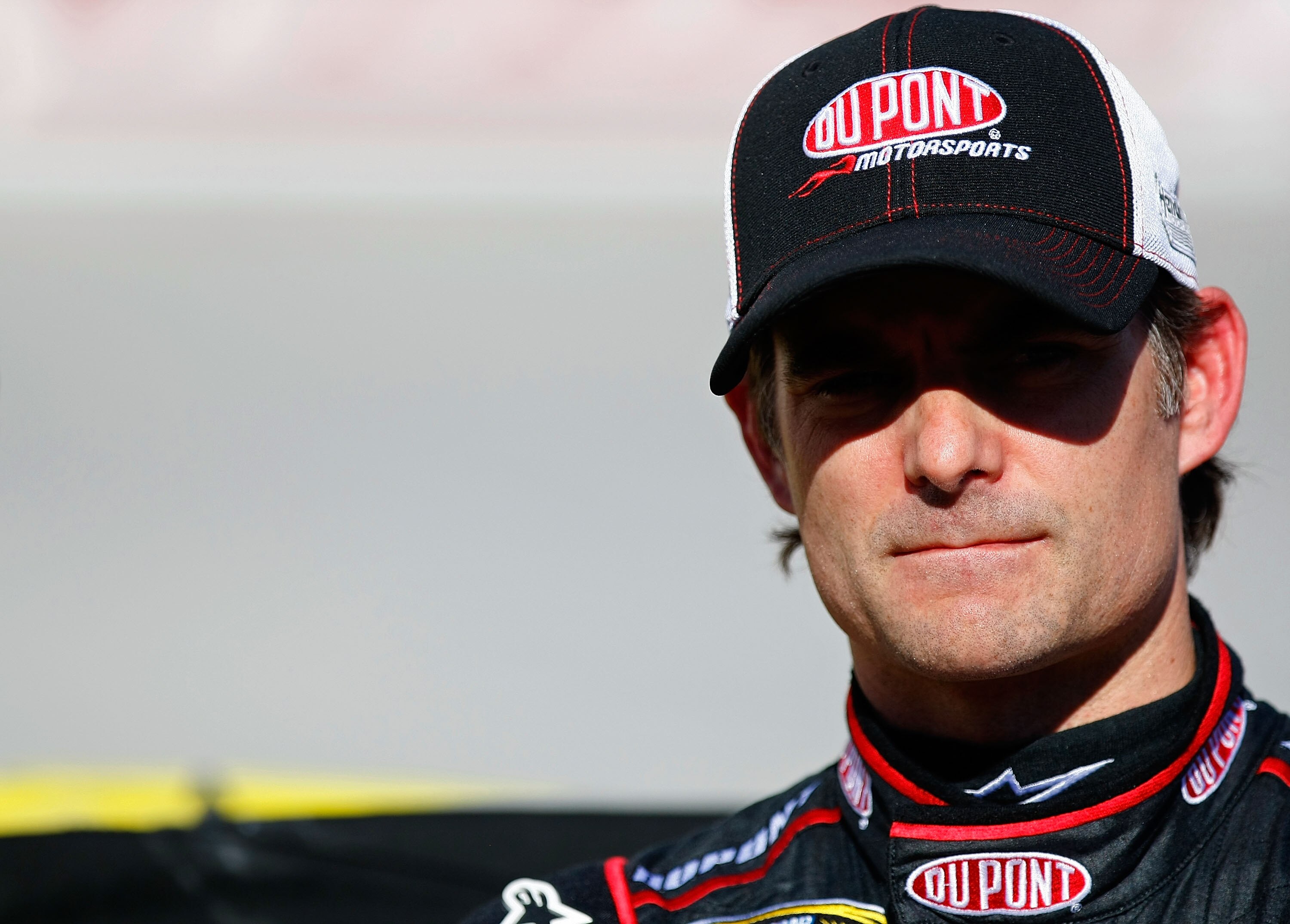 BRISTOL, TN - AUGUST 20:  Jeff Gordon, driver of the #24 DuPont Chevrolet, stands on the grid during qualifying for the NASCAR Sprint Cup Series IRWIN Tools Night Race at Bristol Motor Speedway on August 20, 2010 in Bristol, Tennessee.  (Photo by Geoff Bu