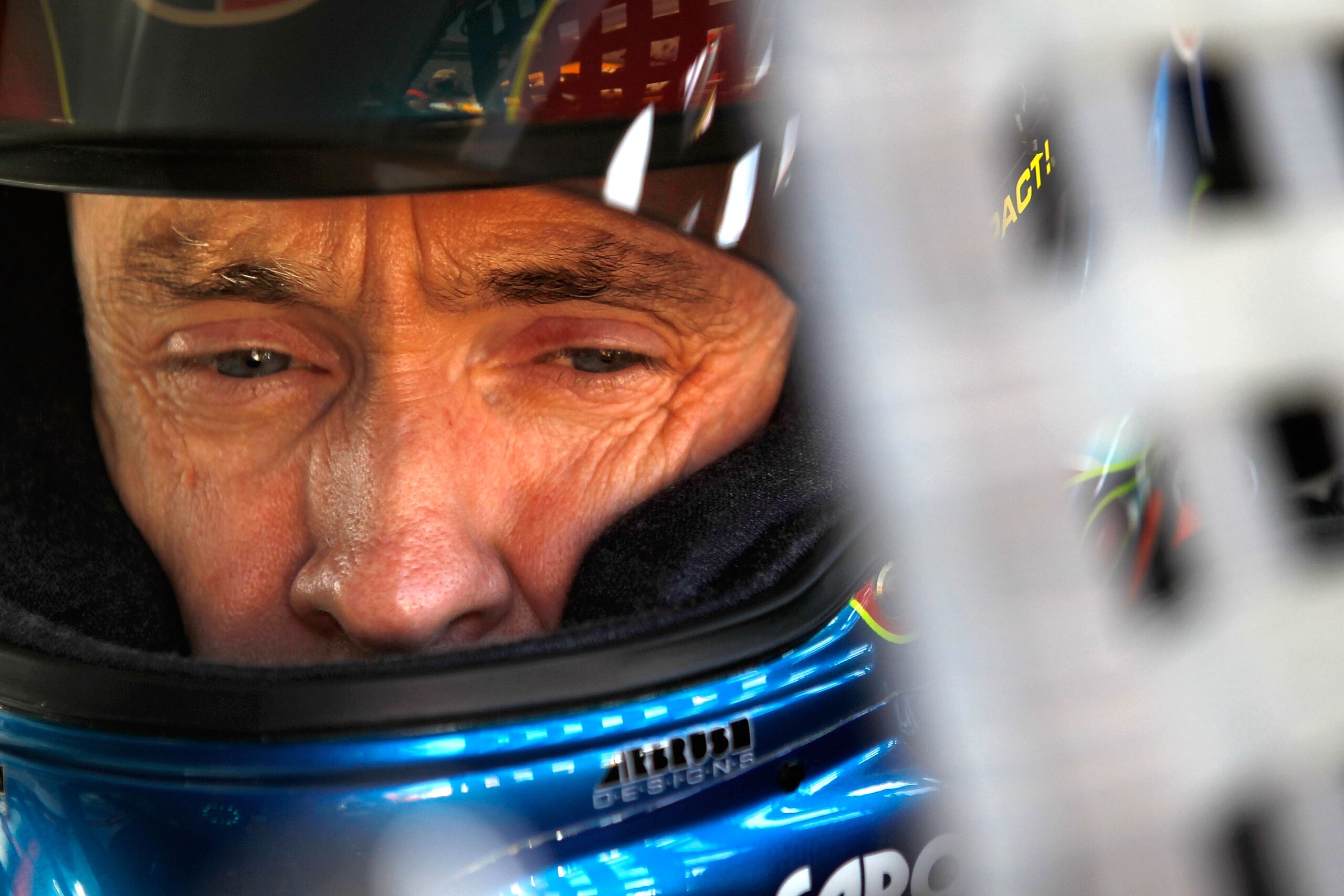 BRISTOL, TN - AUGUST 20: Mark Martin, driver of the #5 CARQUEST Auto Parts Chevrolet, sits in his car prior to practice for the NASCAR Sprint Cup Series IRWIN Tools Night Race at Bristol Motor Speedway on August 20, 2010 in Bristol, Tennessee. (Photo by BRISTOL, TN - AUGUST 20: Mark Martin, driver of the #5 CARQUEST Auto Parts Chevrolet, sits in his car prior to practice for the NASCAR Sprint Cup Series IRWIN Tools Night Race at Bristol Motor Speedway on August 20, 2010 in Bristol, Tennessee. (Photo by